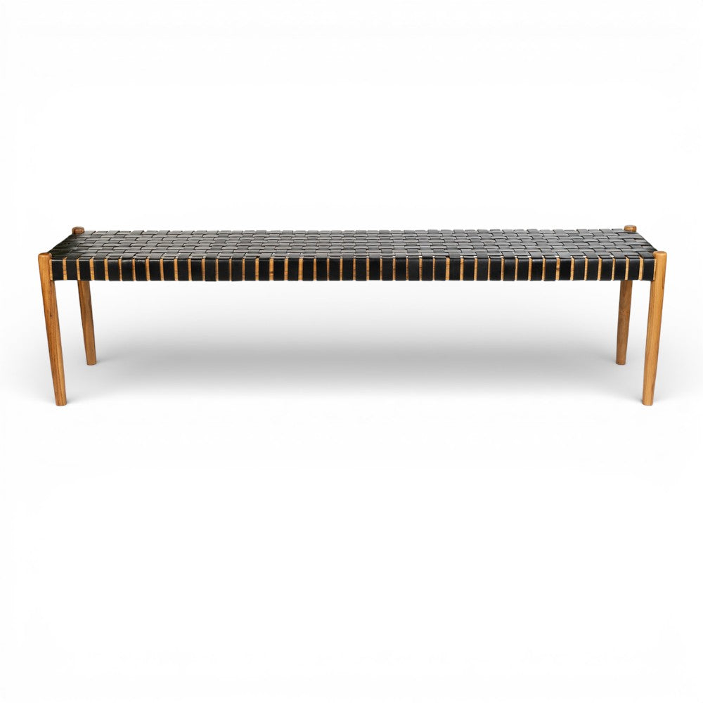 Long bench with woven design on a white background