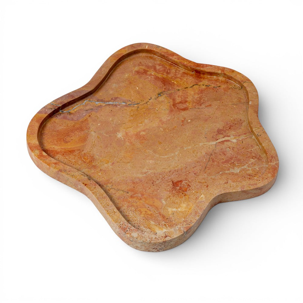 Decorative stone tray with a unique shape on a white background