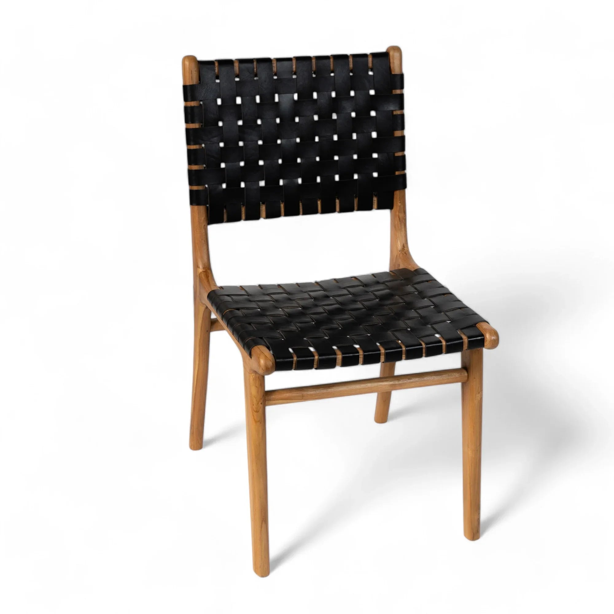 Handmade dining chair with natural wood frame and black woven leather seat by Kayu Living
