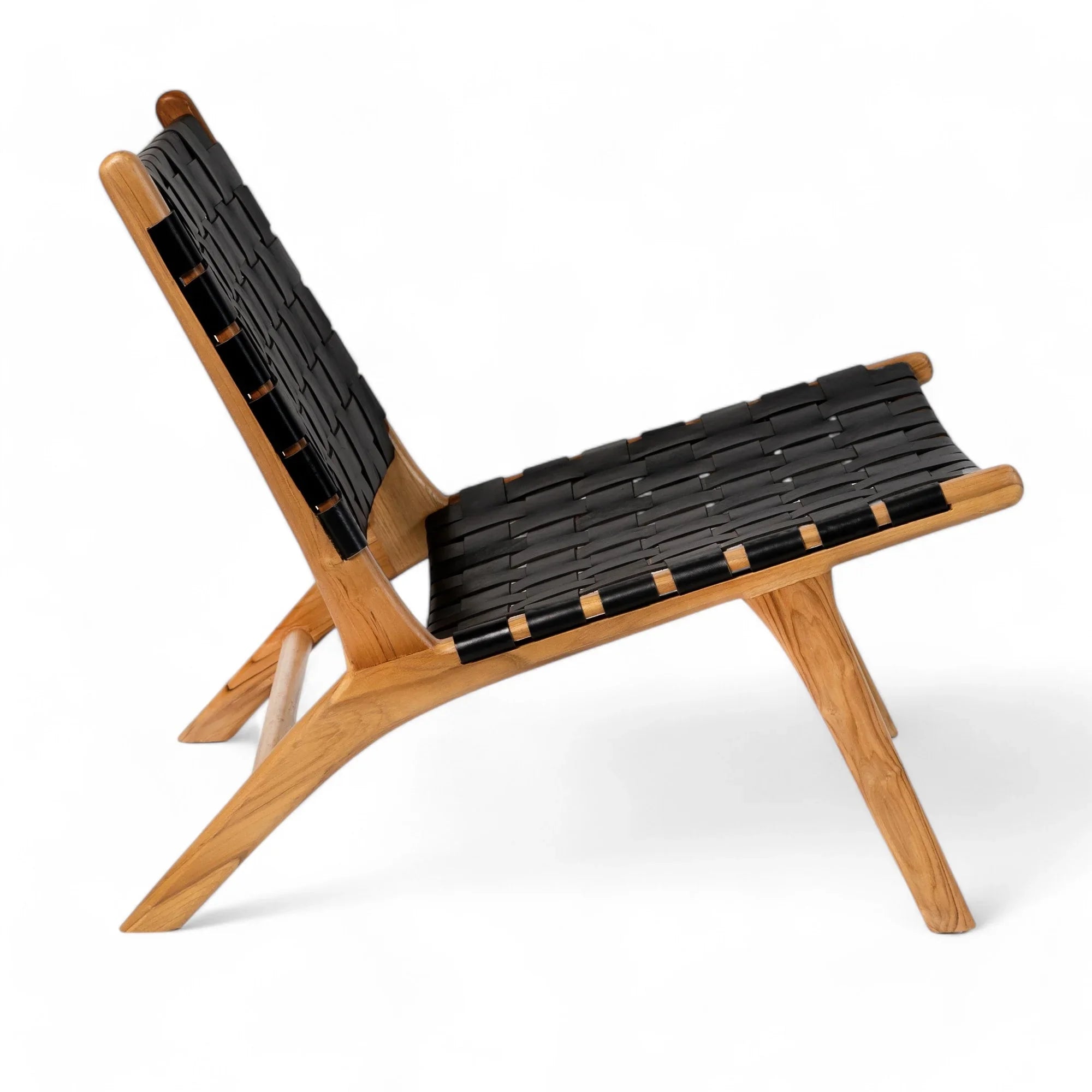 Handcrafted black woven lounge chair with natural wood frame, Kayu Living furniture