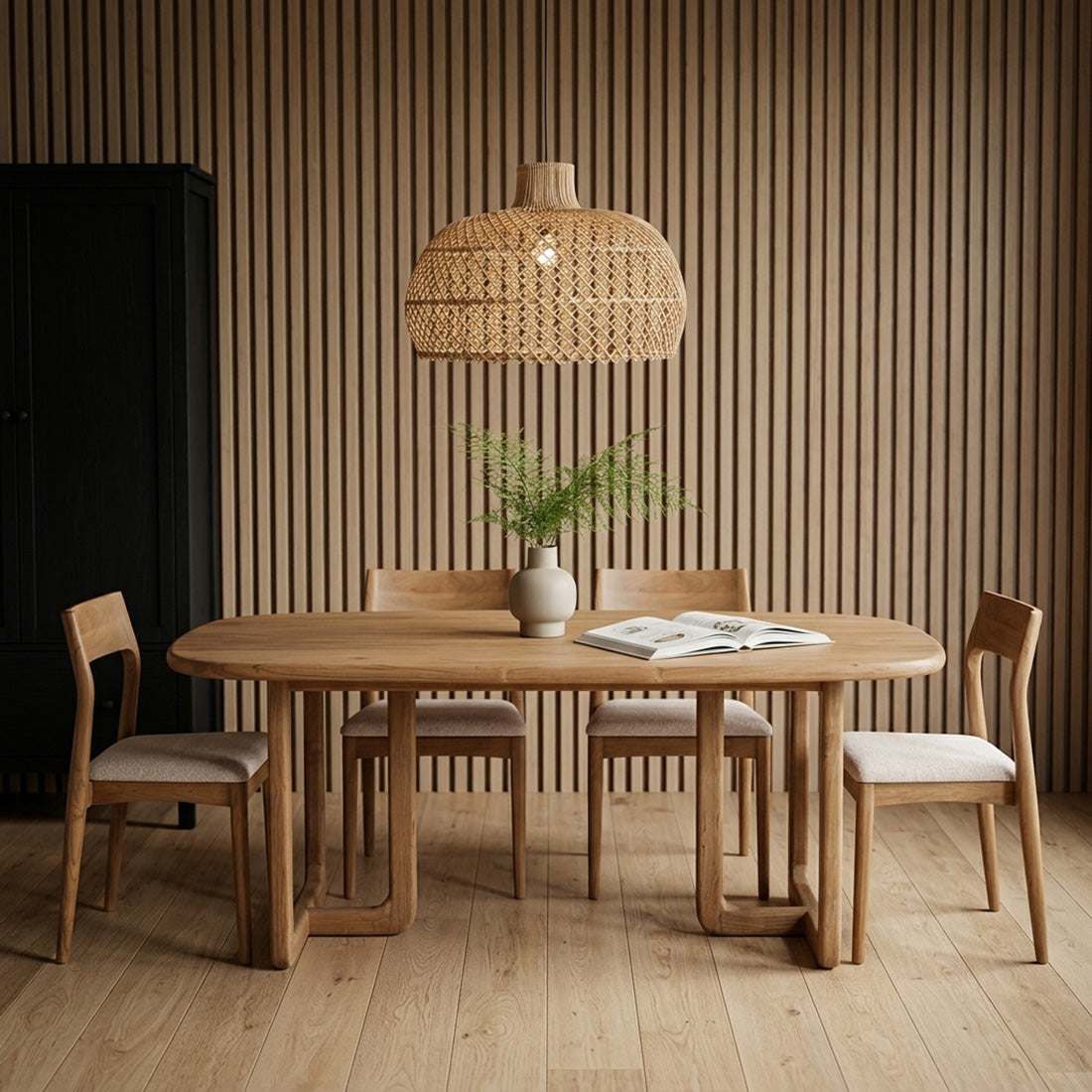 Teak wood dining table by Raw Materials, 200 cm long, showcasing a smooth polished surface and sturdy legs for a modern dining room.