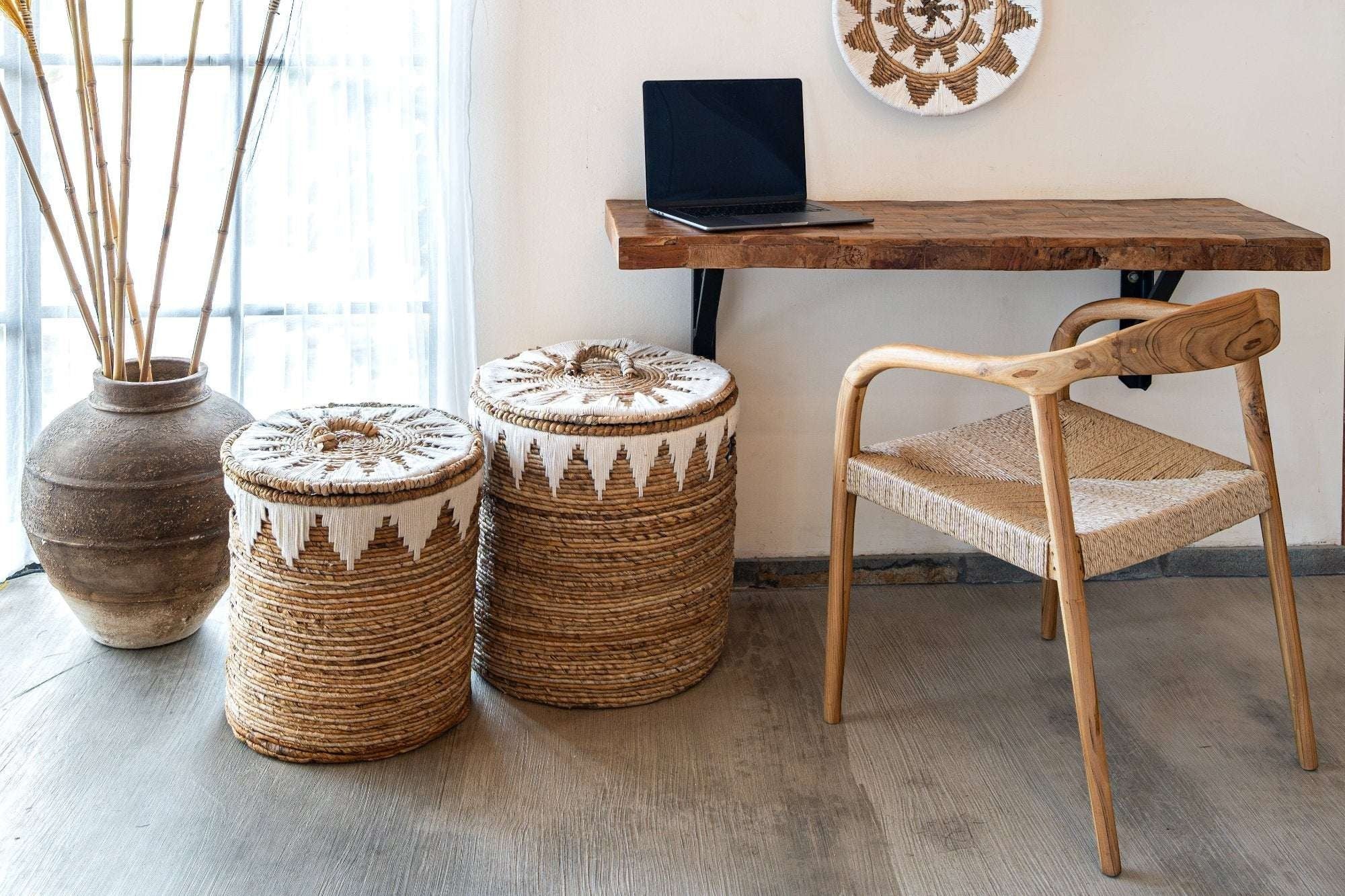 Kayu Living natural banana cord storage basket with lid and white embroidery detail.