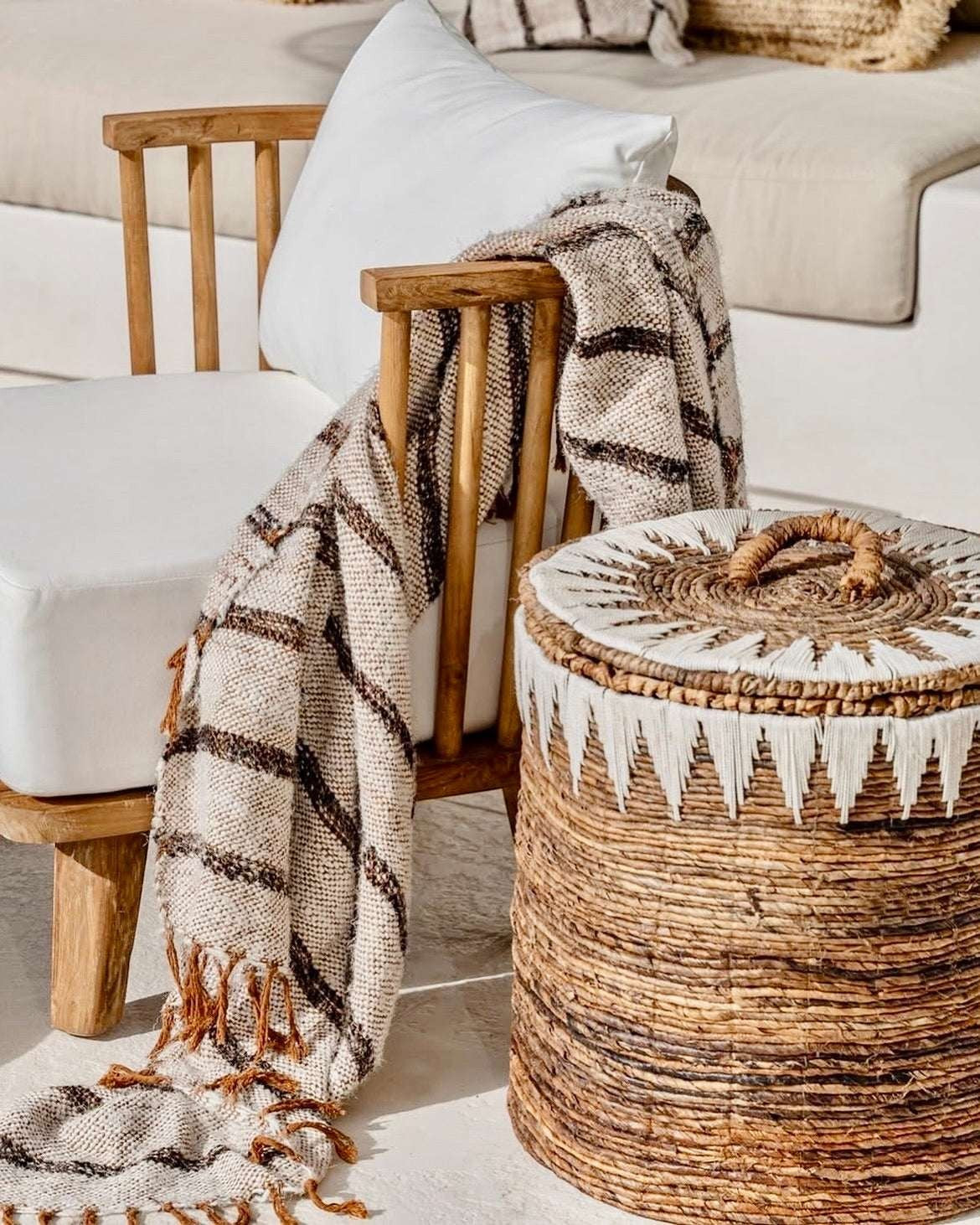 Kayu Living natural banana cord storage basket with lid, featuring white embroidery and a woven handle. Ideal for home organization.