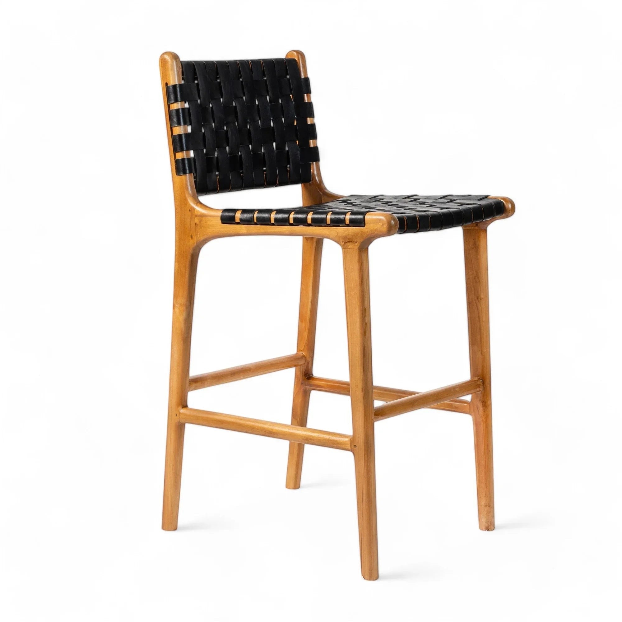 Kayu Living Umalas counter stool with woven black leather seat and backrest on a light wood frame.