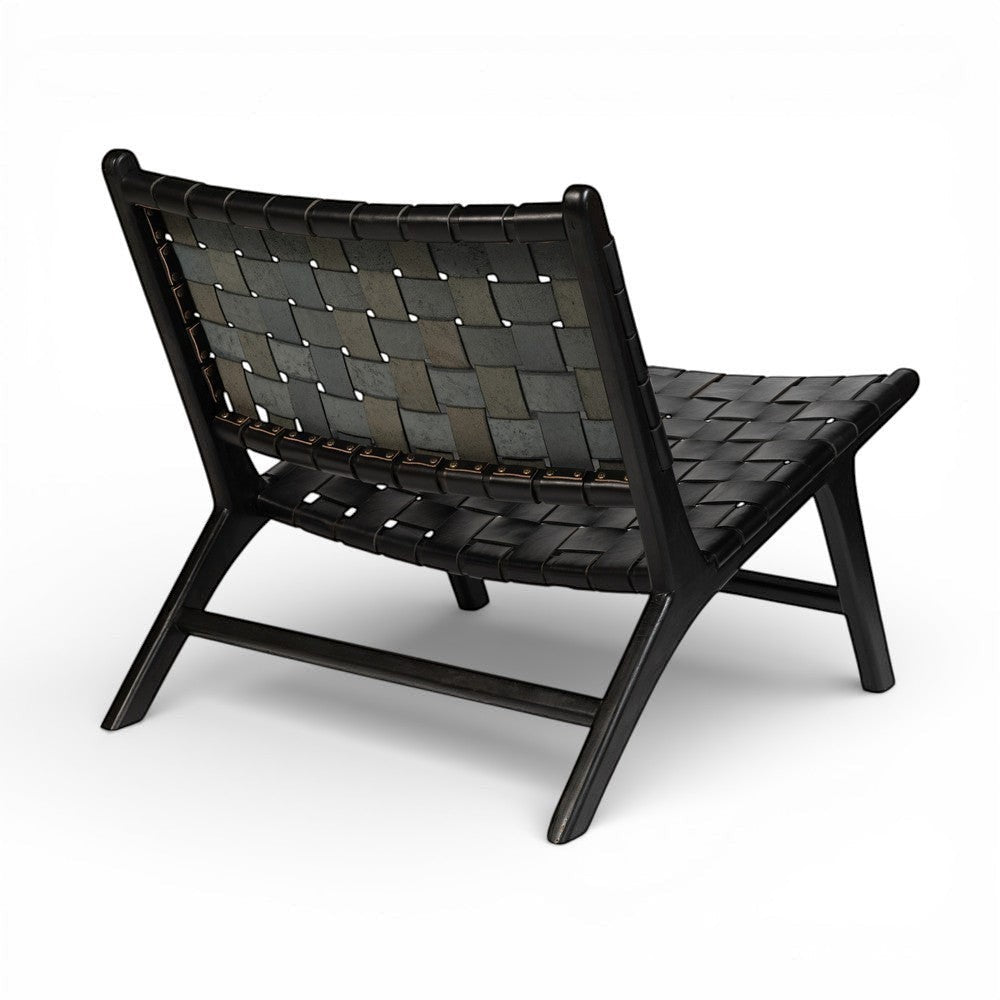 Kayu Living 'Hitam' lounge chair with black handwoven leather seat and black teak frame. Modern design.
