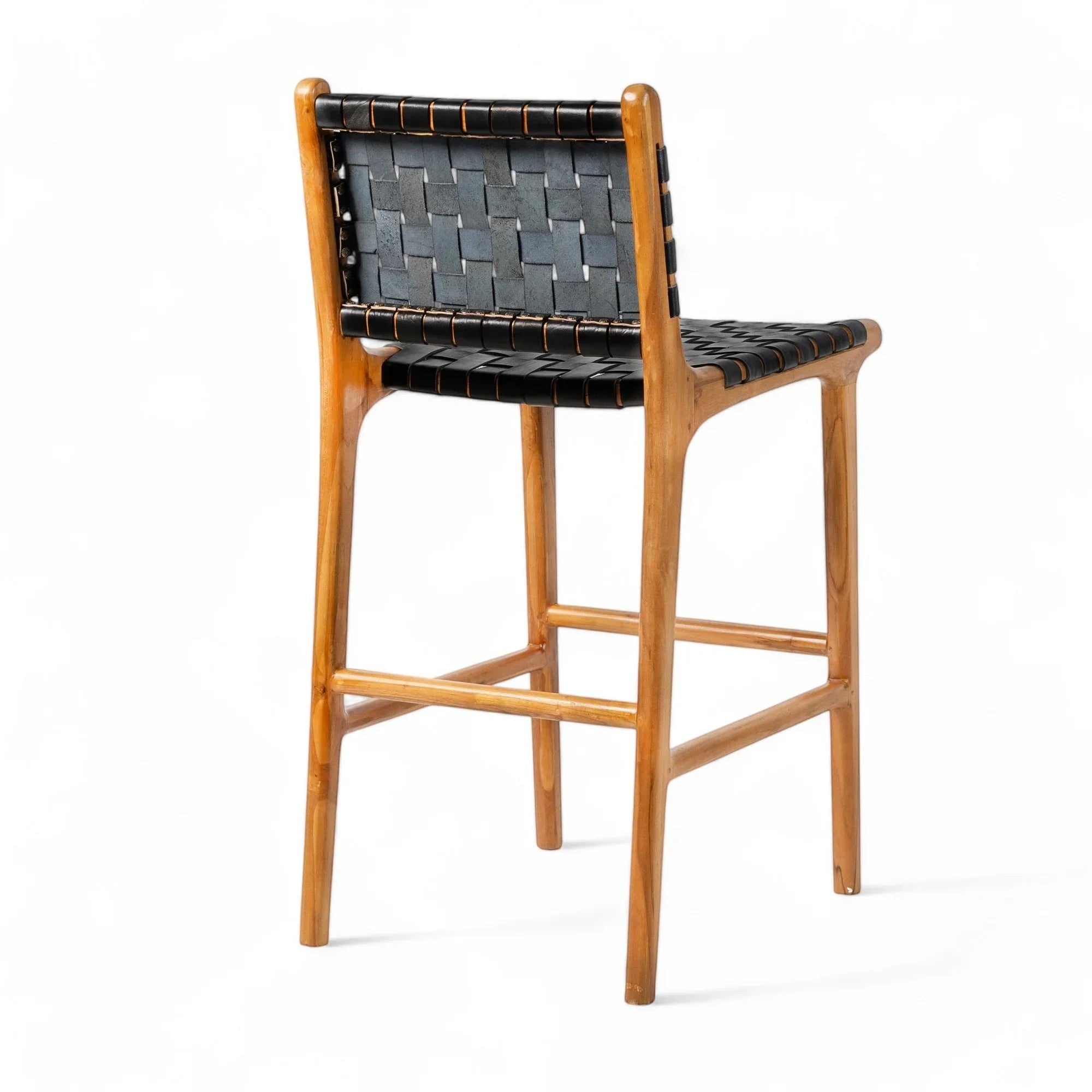 Kayu Living Umalas black woven leather counter stool with natural teak wood frame. Modern bar stool for kitchen or dining.