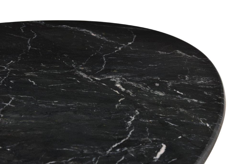 Kayu Living oval dining table featuring a polished black marble top with natural white veining details.