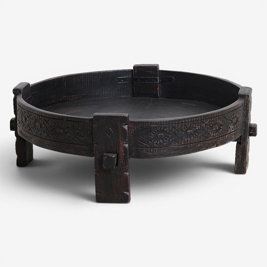 Kayu Living black hand-carved recycled wood Chakki side table with a low profile and intricate traditional detailing.