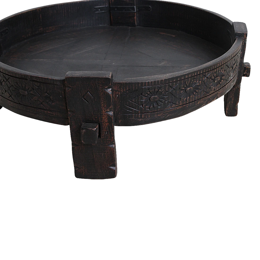 Kayu Living black hand-carved recycled wood Chakki side table with a low profile and intricate floral rim detailing.