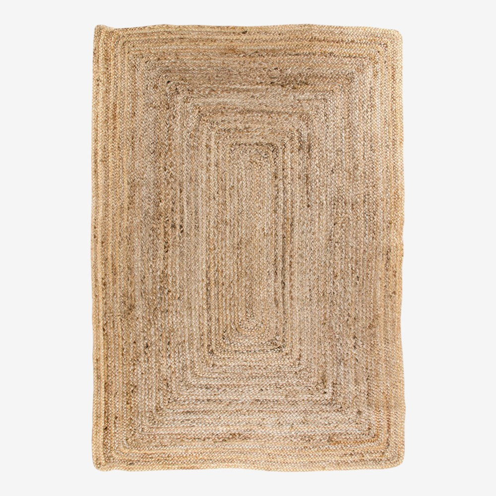 Kayu Living Bombay braided jute rug, natural, 180 x 240 cm. Hand-braided jute with a rustic texture and neutral tone.
