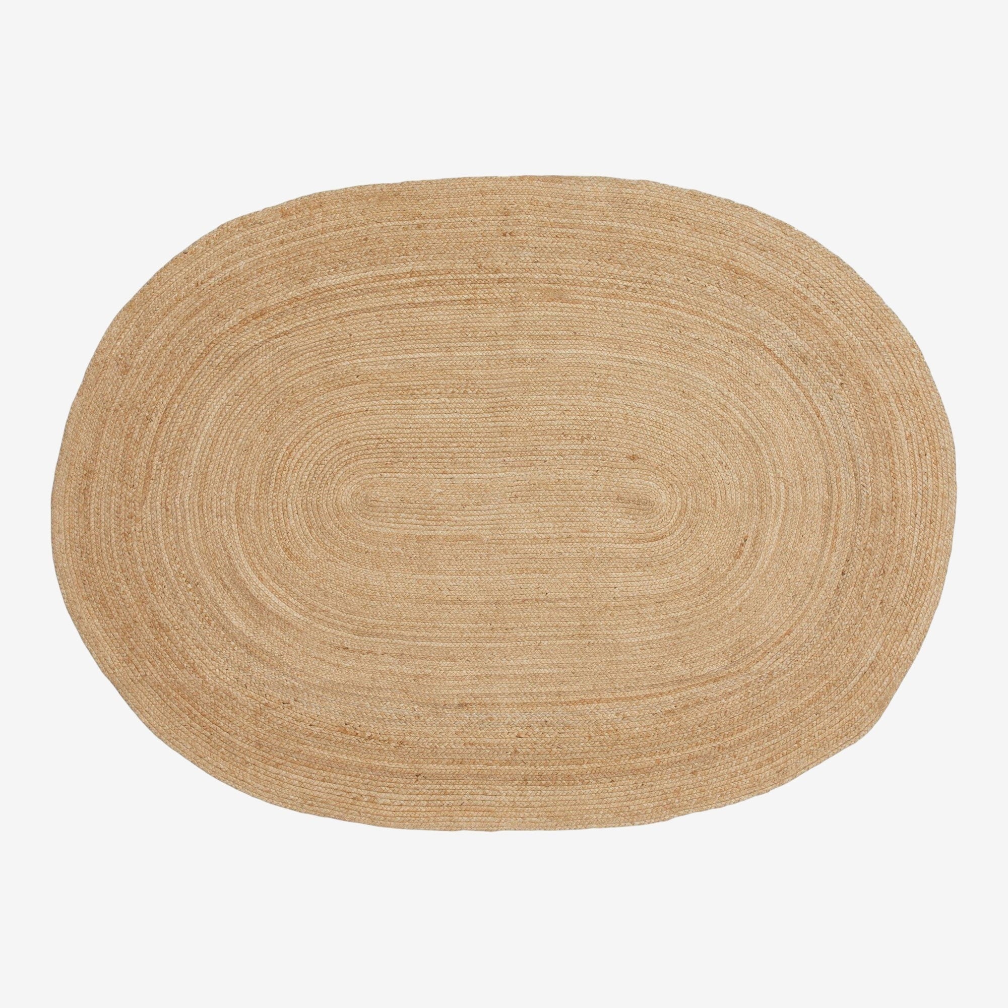 Kayu Living Bombay oval braided jute rug in natural tones, 140 x 200 cm. Eco-friendly and durable.