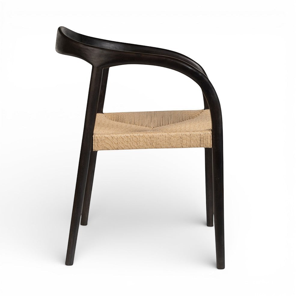 Kayu Living Cemagi chair with dark brown teak frame and handwoven natural rope seat, suitable for indoor/outdoor use.