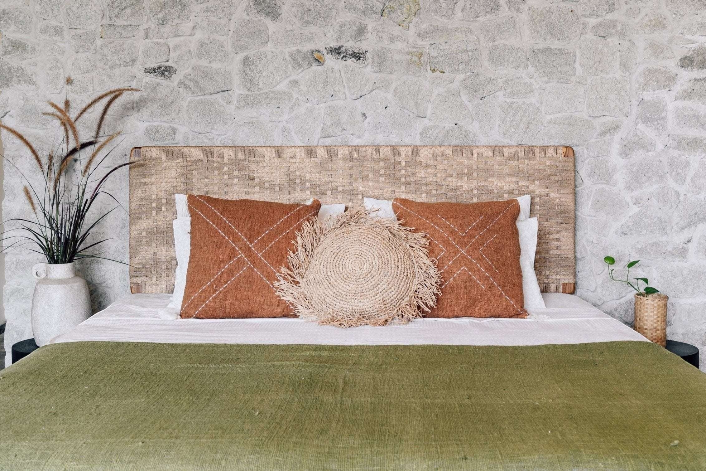 Kayu Living Cemagi handwoven rope headboard with solid teak frame, natural finish. Adds texture to bedroom.