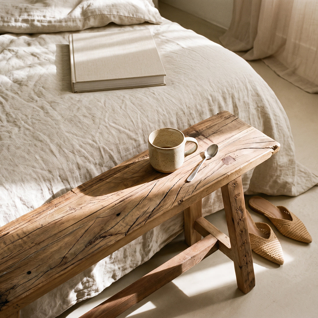 Kayu Living Farmwood wooden bench in a bedroom, featuring rustic reclaimed wood with natural knots and grain.