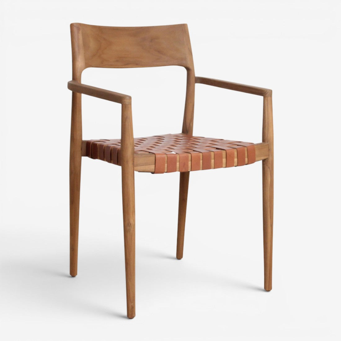 Kayu Living Freya brown teak dining chair with armrests and a woven leather seat for a Scandinavian interior.