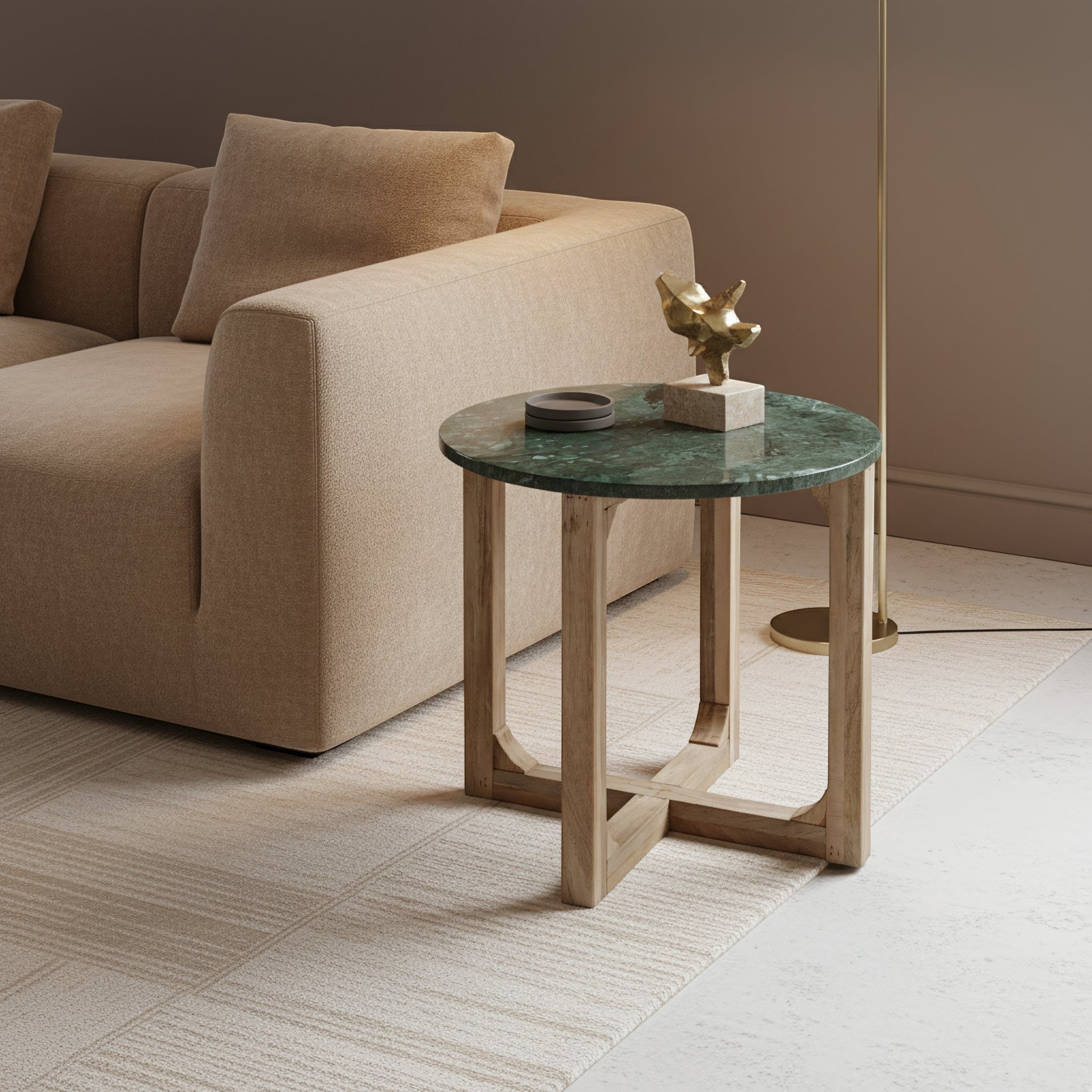 Kayu Living round side table with a deep green marble top and a natural mango wood base in a modern living room.