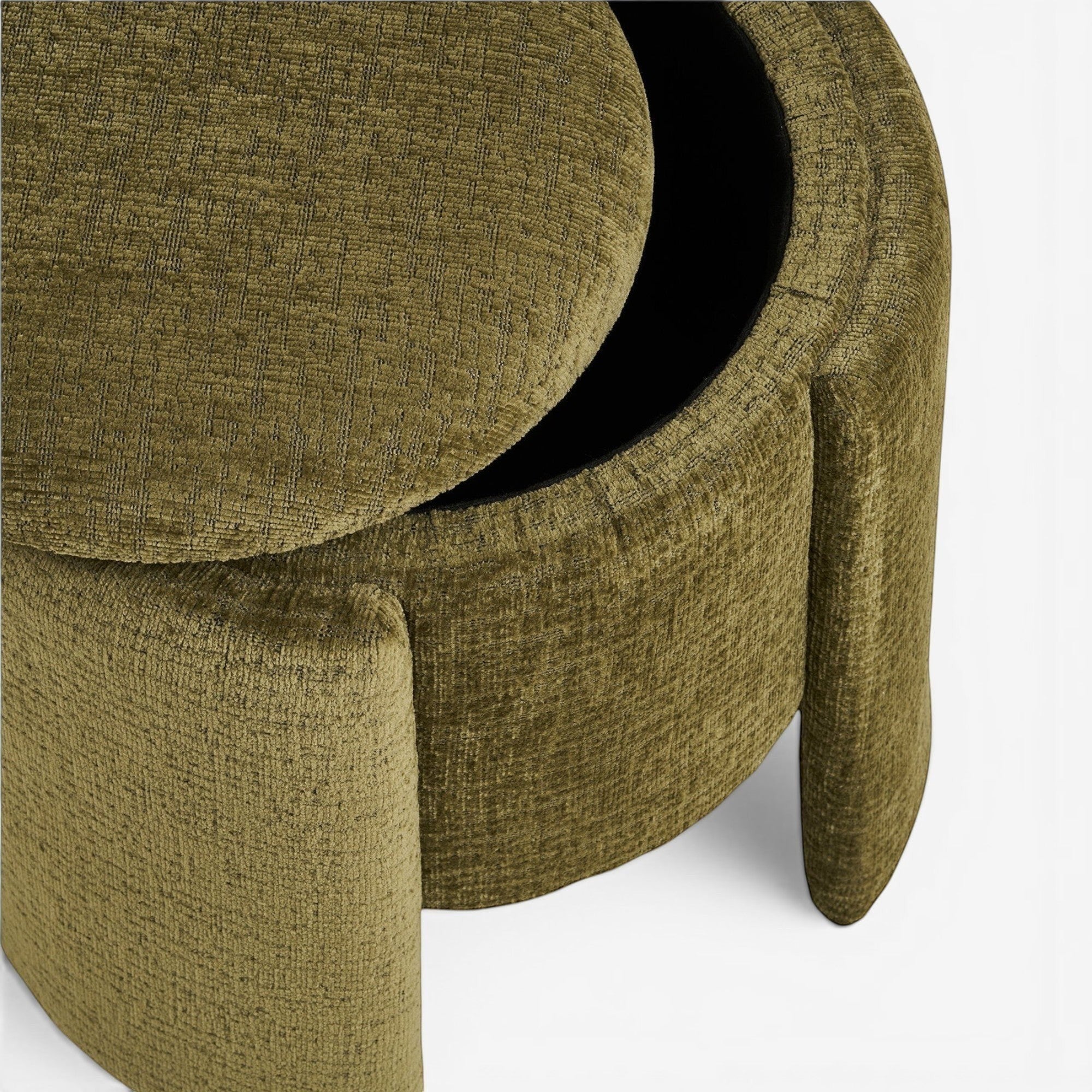 Kayu Living green round pouf with textured fabric upholstery and hidden storage. Features a lift-off lid and compact design.