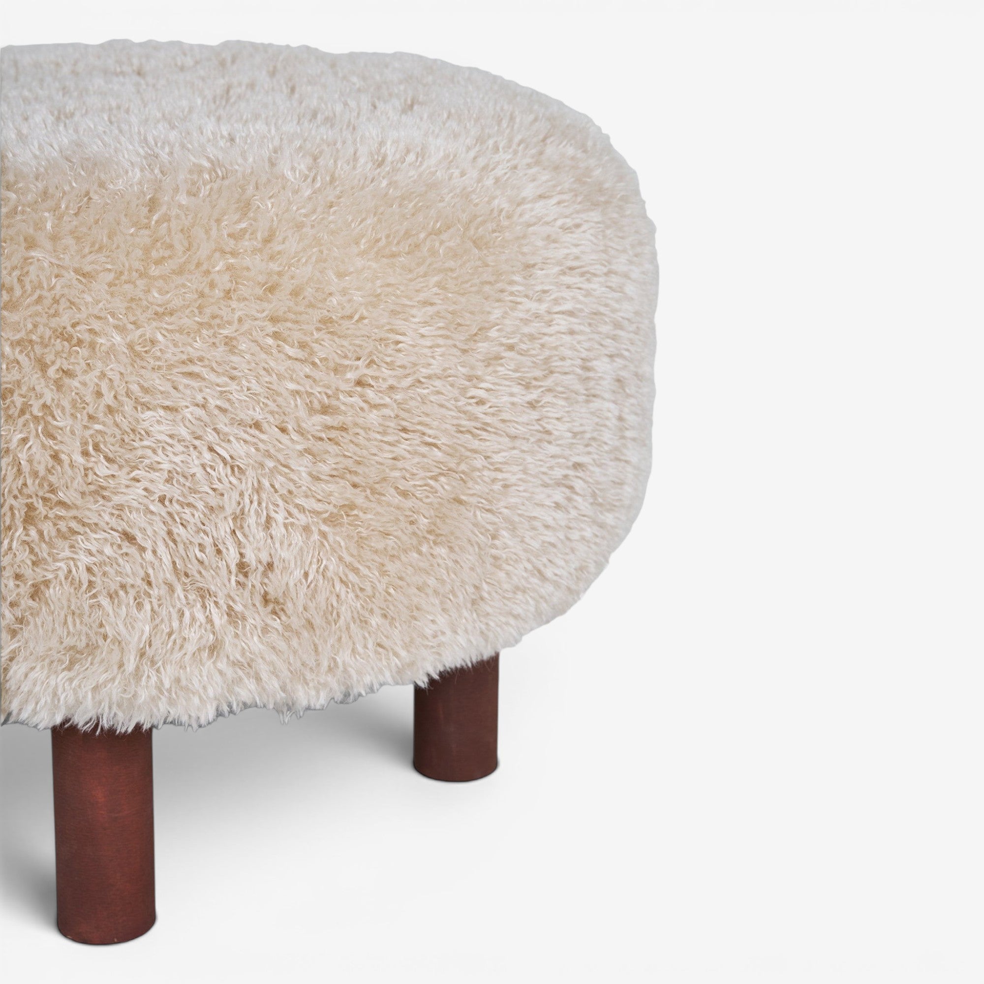 Kayu Living Inverness Pouf, cream boucle upholstery, round shape, wooden legs. Versatile as seating or footrest.