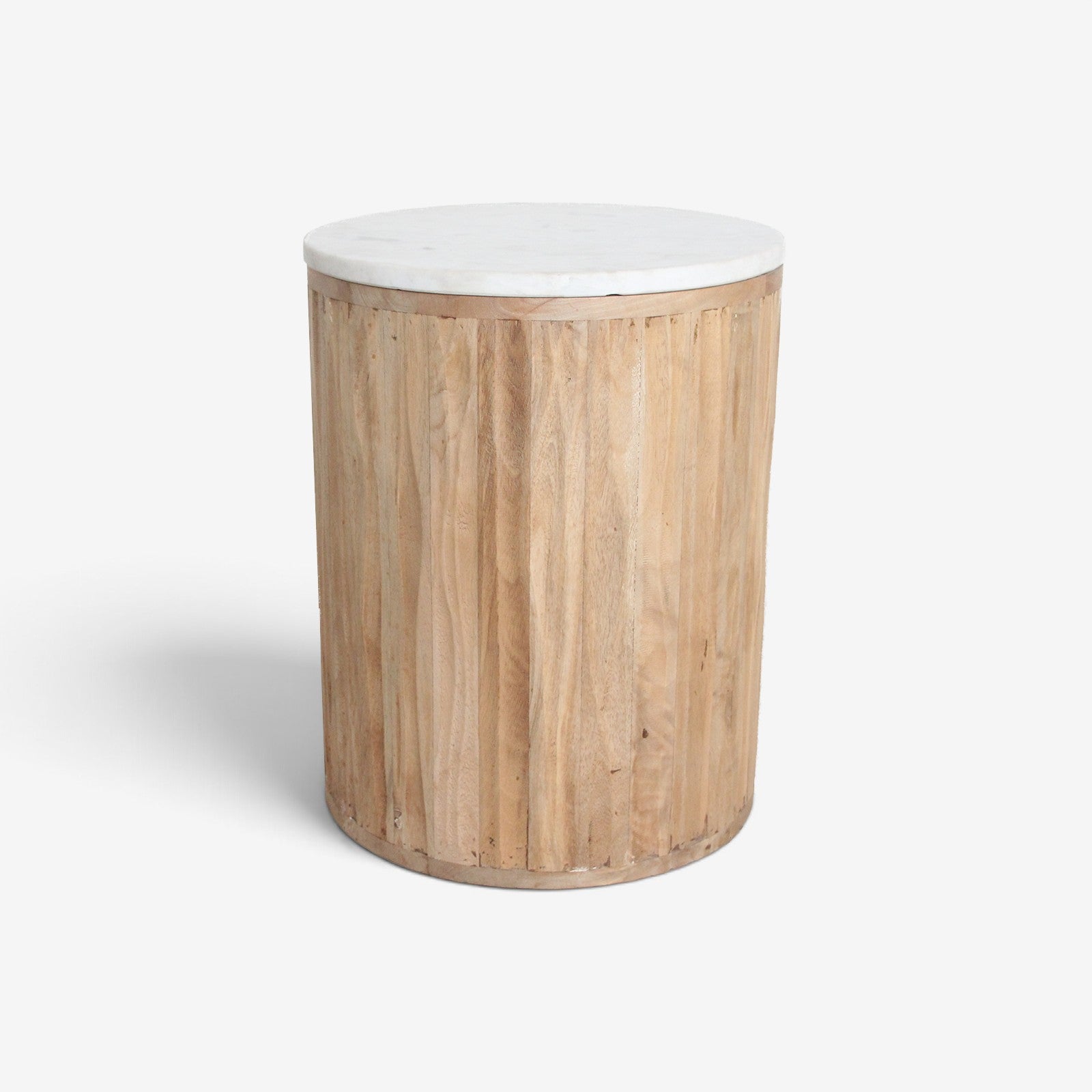 Kayu Living Malakka side table with a round white marble top and a cylindrical carved mango wood base.