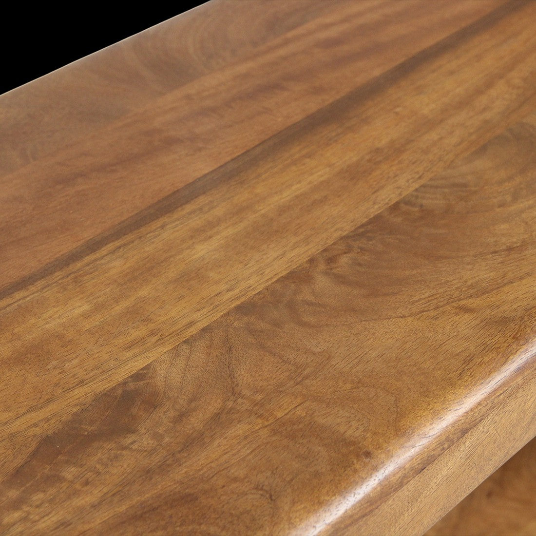 Close-up of Kayu Living bullnose mango wood shelf showing natural grain patterns and smooth rounded edge