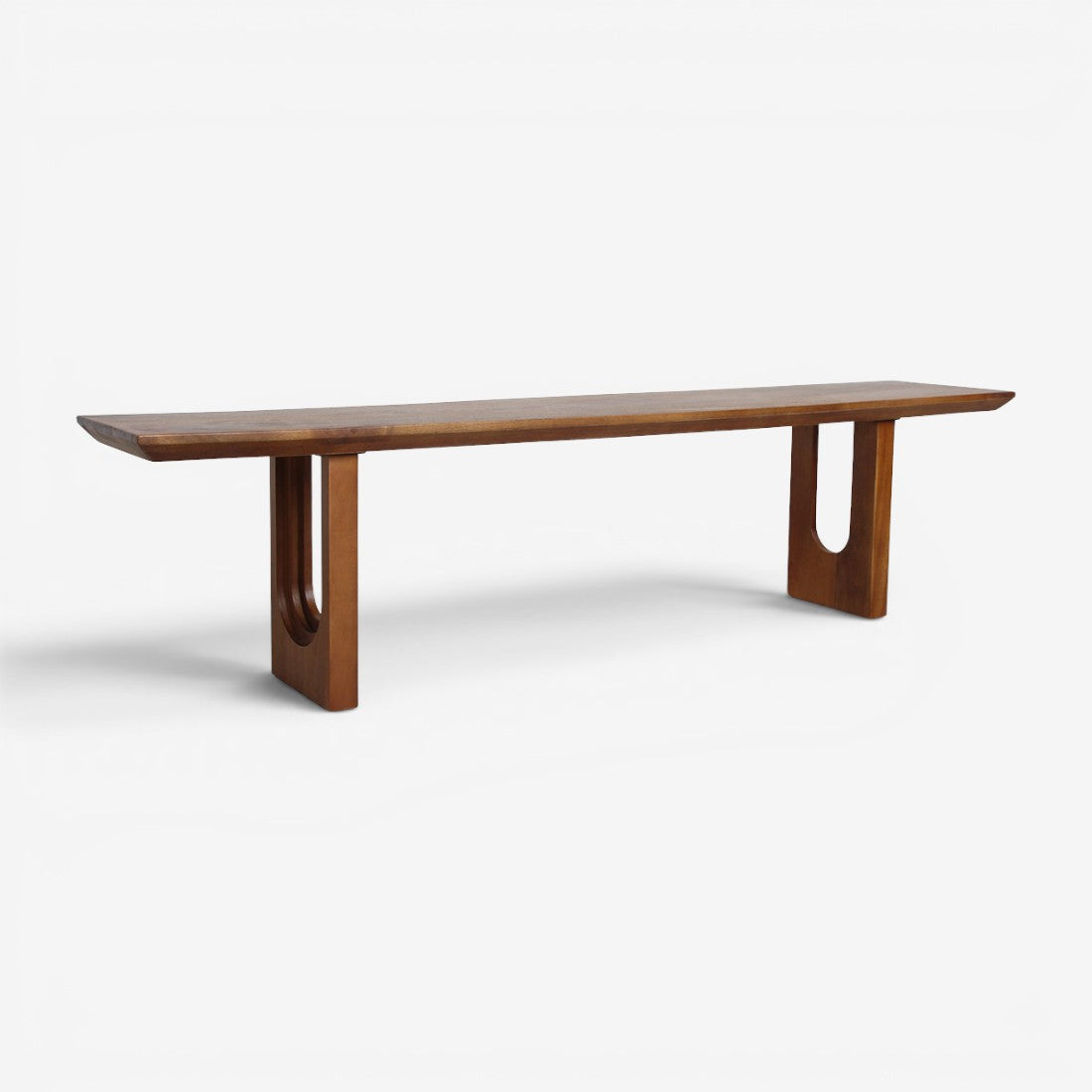 Kayu Living 180cm dining bench in natural mango wood with bullnose chamfered edges and unique U-shaped leg design.