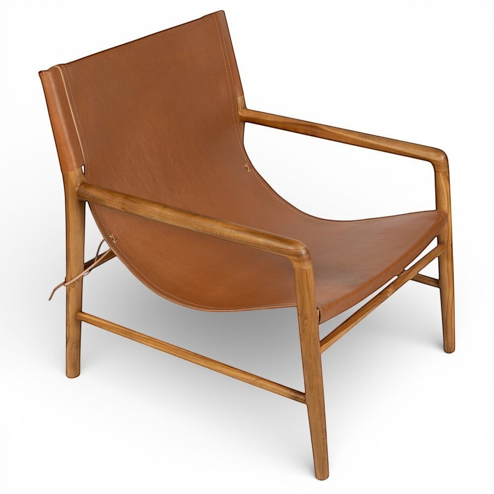 Kayu Living Marita armchair in cognac leather with a teak wood frame. Modern lounge chair with a minimalist design.