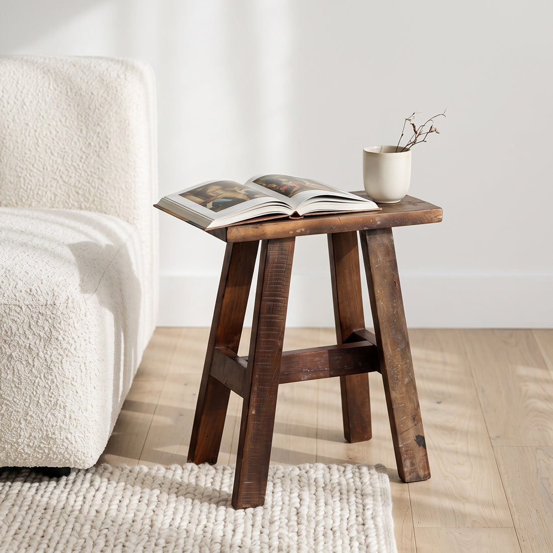 Kayu Living medium industrial wooden bench made from FSC-recycled wood with a warm patina, used as a side table.
