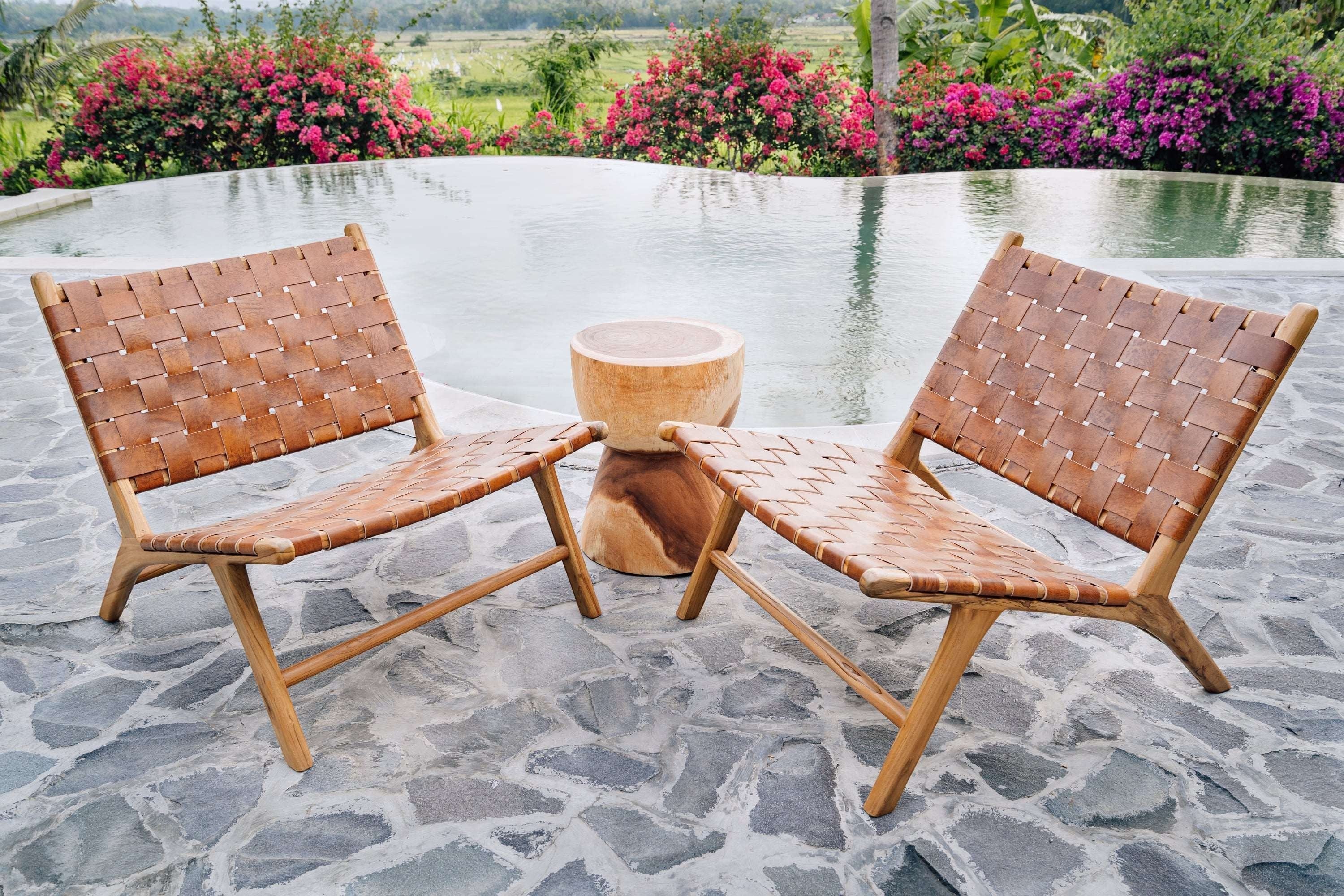 Kayu Living Sanur lounge chair with handwoven camel leather seat and teak frame. Modern design.