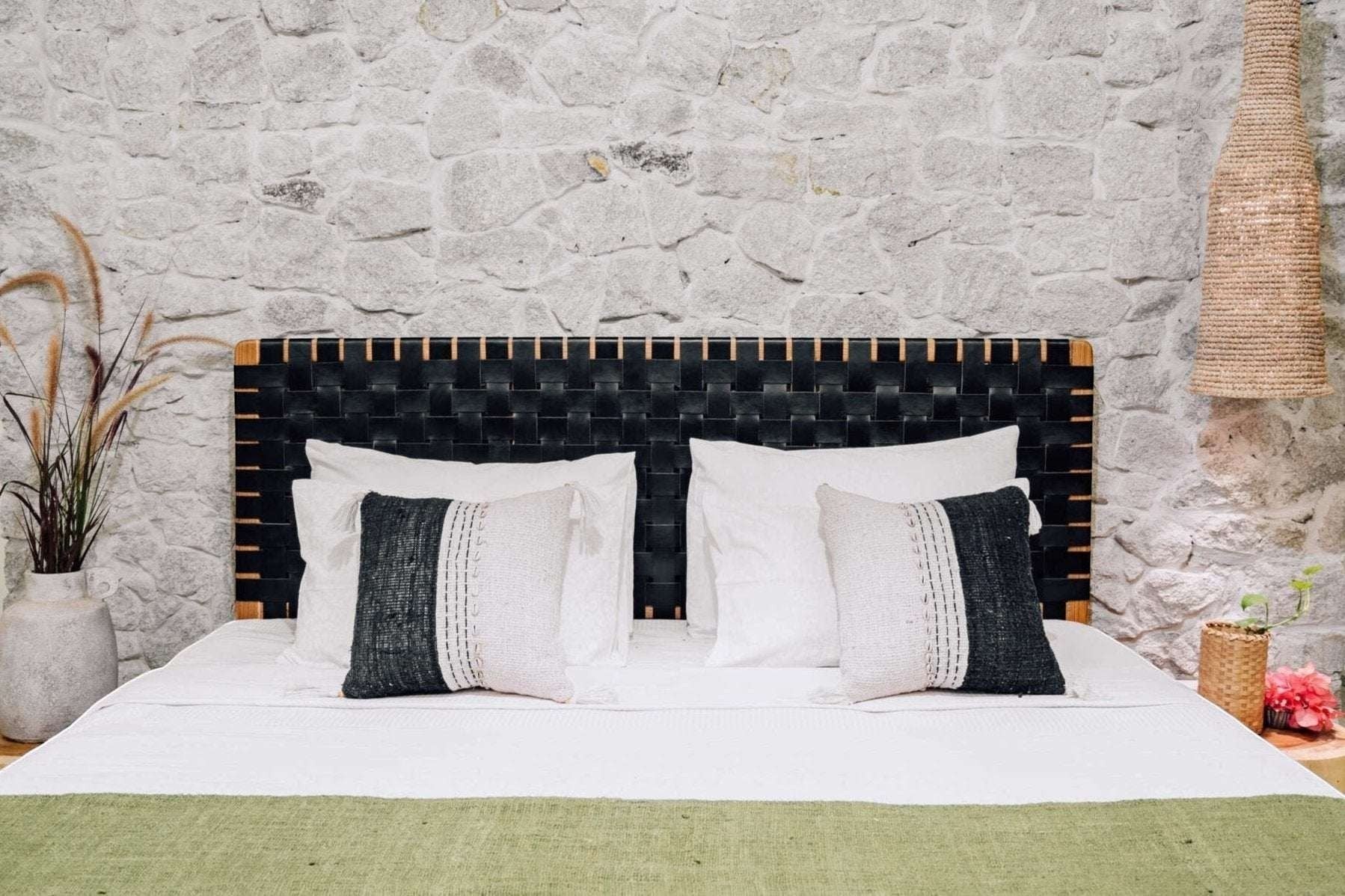 Kayu Living Umalas headboard: handcrafted teak frame with black woven leather straps. Modern artisanal design.