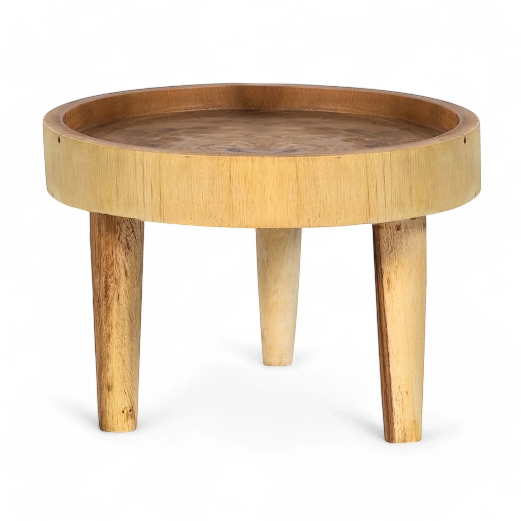 Kayu Living Ulu side table crafted from suar wood with a natural finish and three tapered legs. Unique grain patterns.