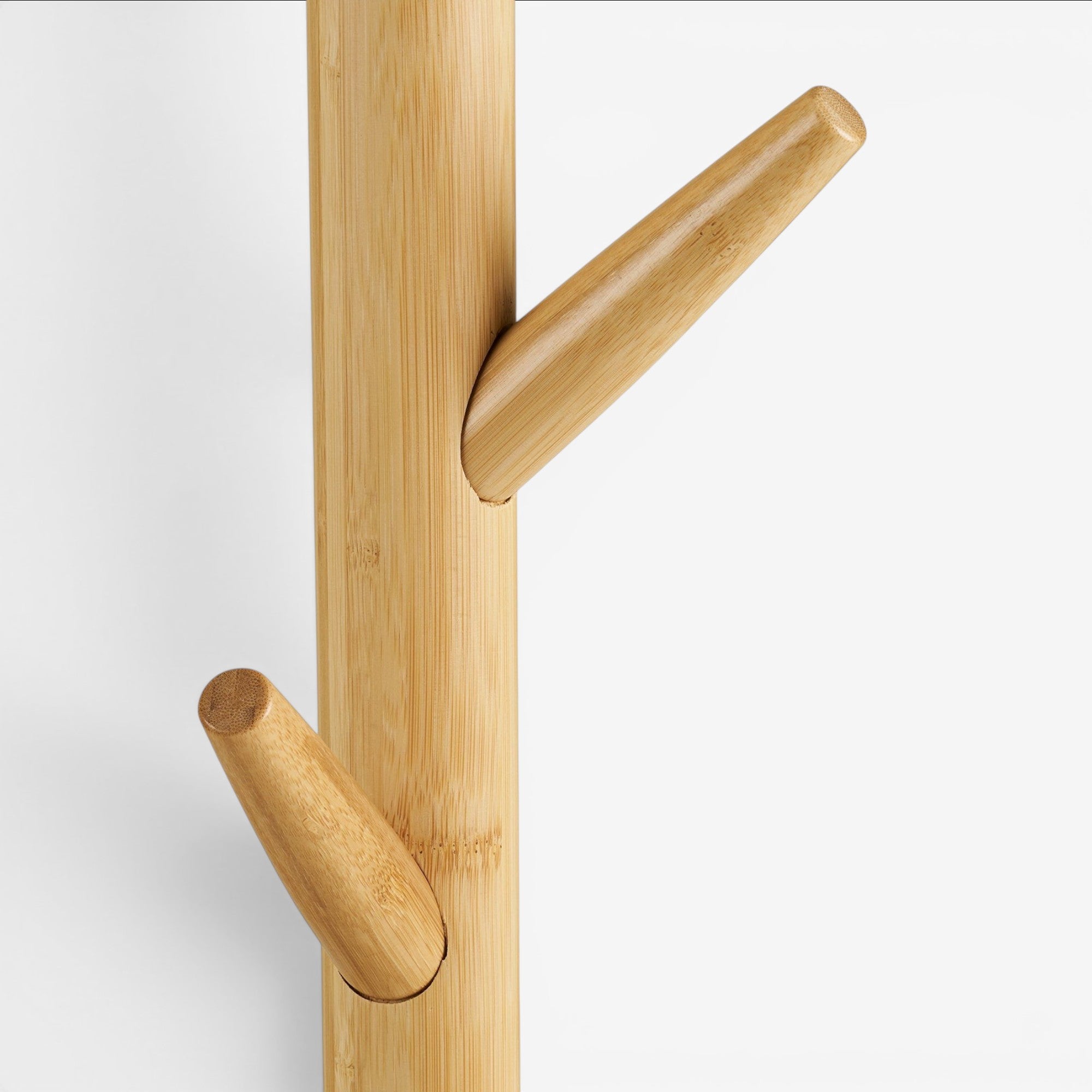 Kayu Living Wanaka Coat Rack: Natural bamboo tree-style coat rack with multiple hanging pegs. Eco-friendly and stylish.