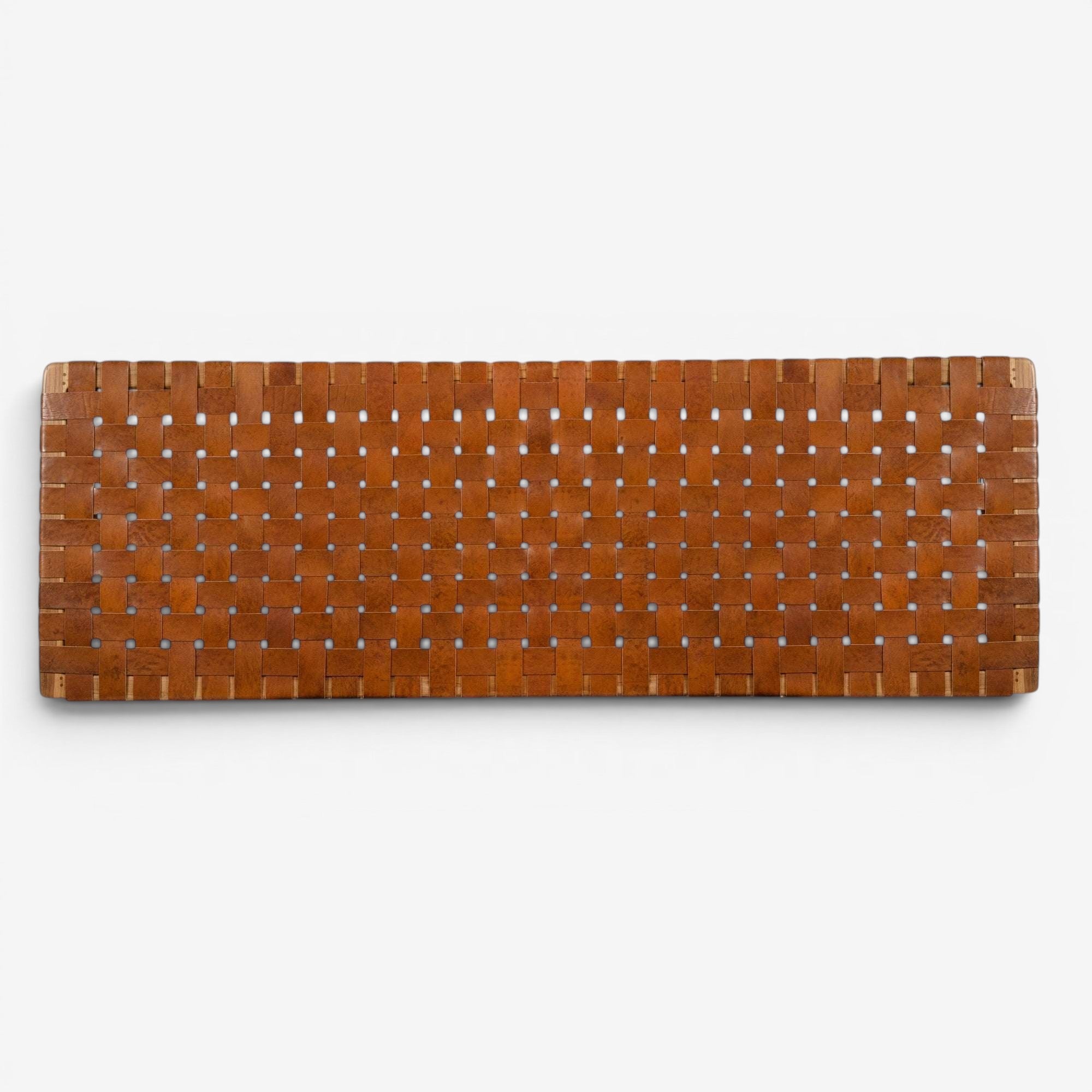 Kayu Living Sanur headboard in woven brown leather with basketweave design. Adds artisanal charm and texture.