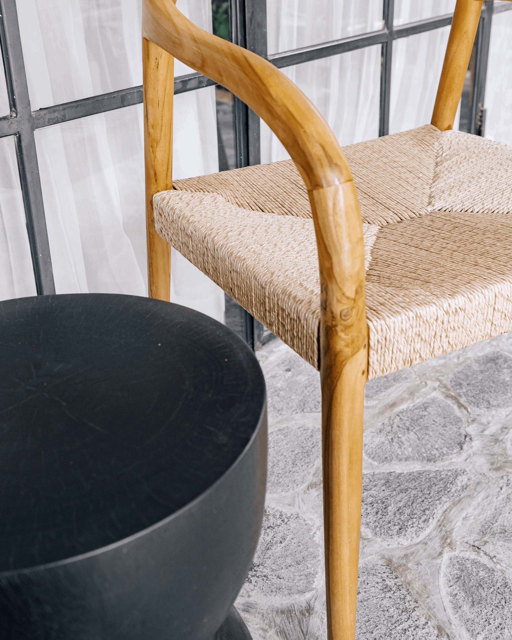 Handmade wooden chair with woven seat and black side table, Kayu Living furniture
