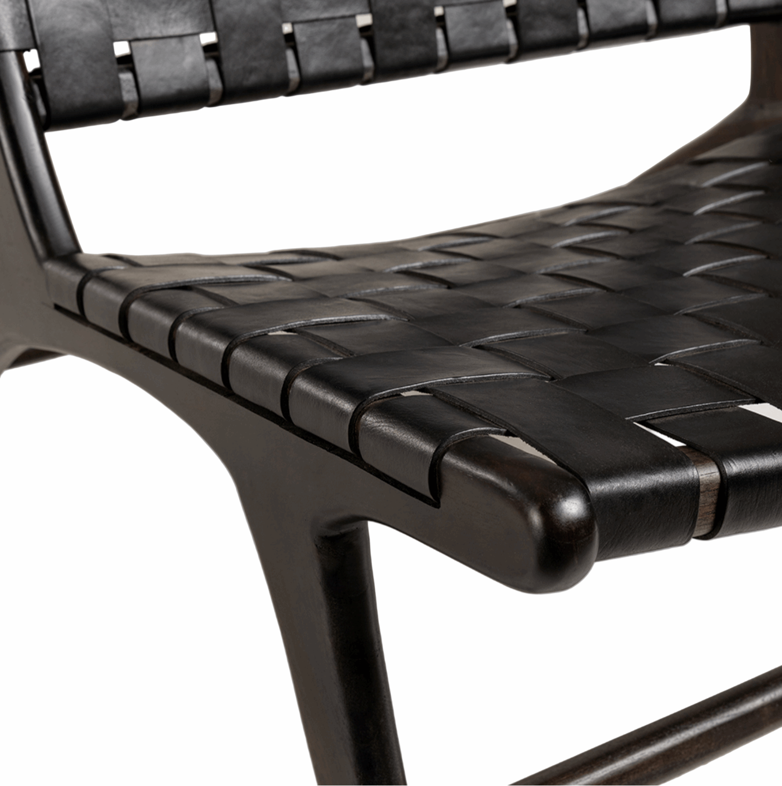 Close-up of a black woven chair seat on a white background