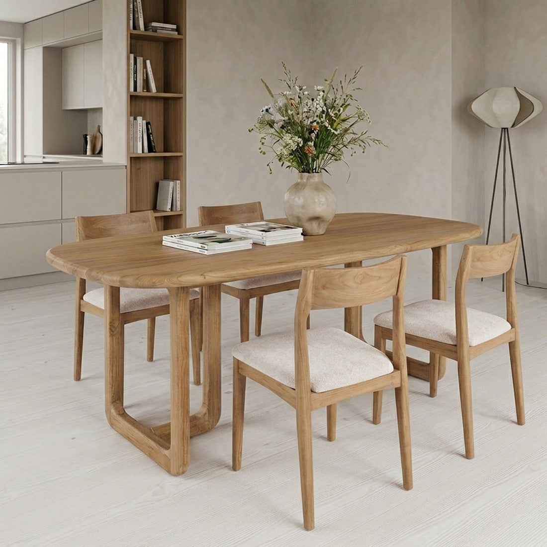 Set of two Raw Materials Freya teak dining chairs in cream with sleek modern design, perfect for contemporary dining rooms.
