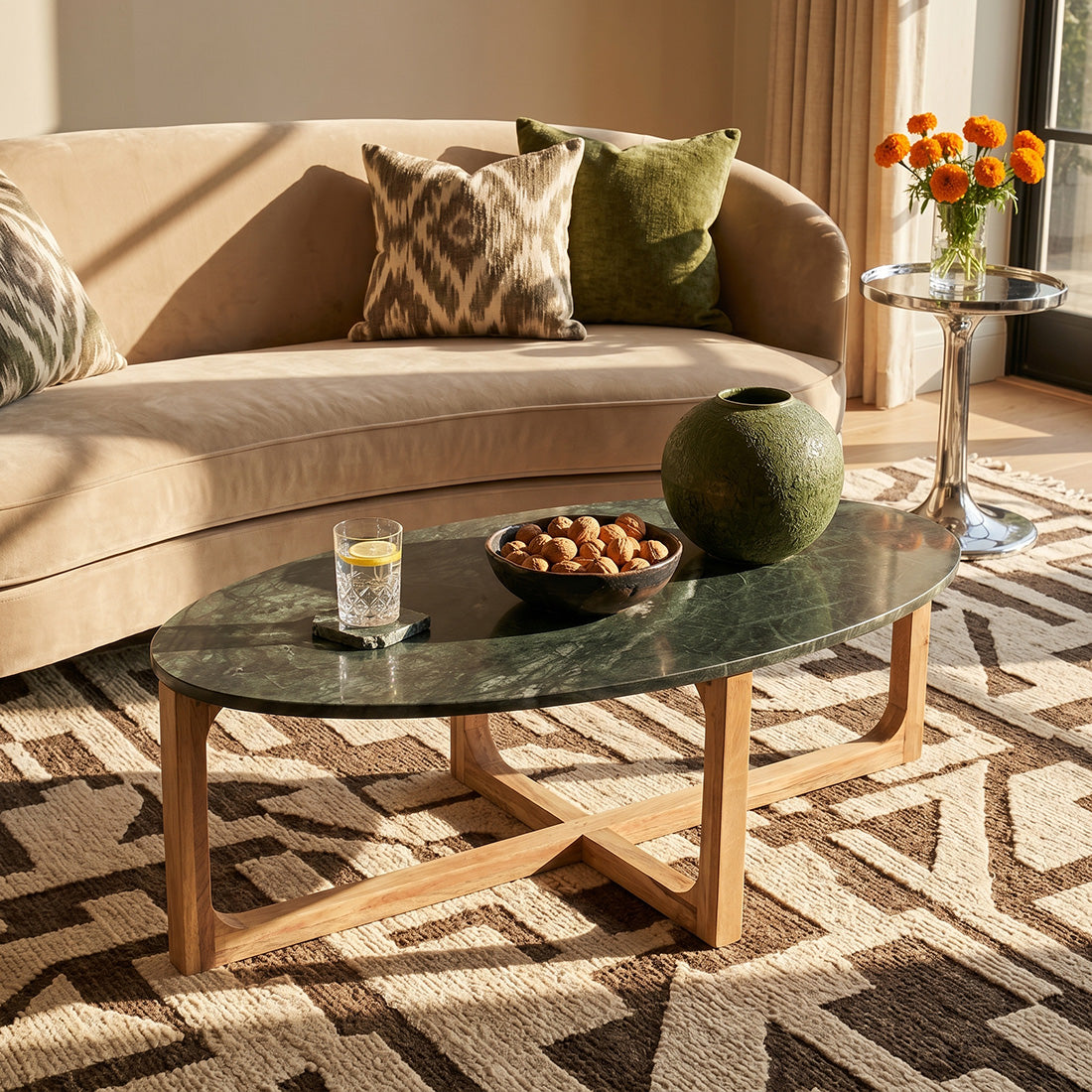 Green marble coffee table by Raw Materials featuring a sleek, modern design and polished surface.