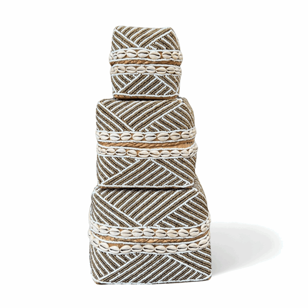 Decorative woven basket with geometric pattern on a white background