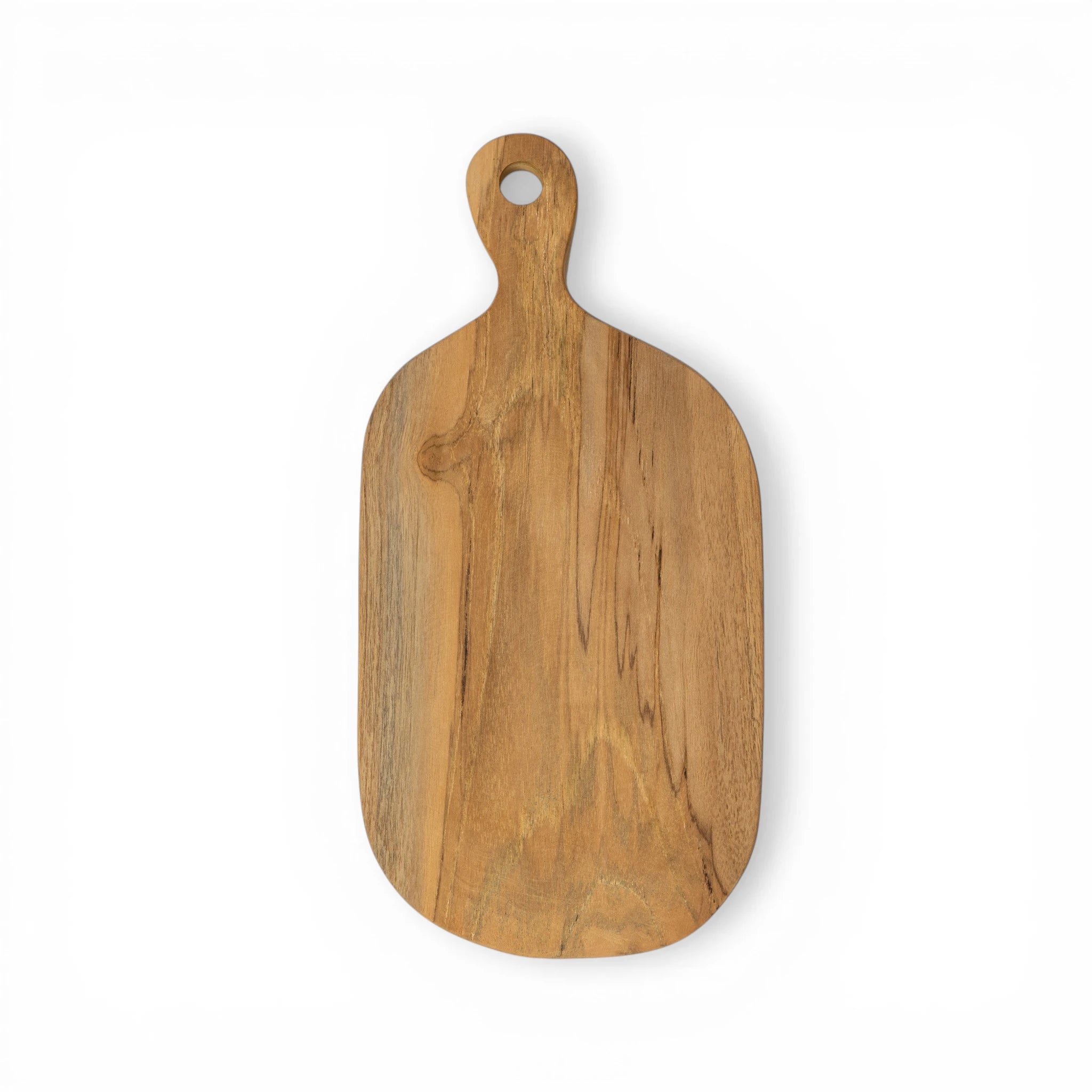 Teak cutting board from Kayu Living, rectangular kitchen prep board with natural wood grain and smooth finish.