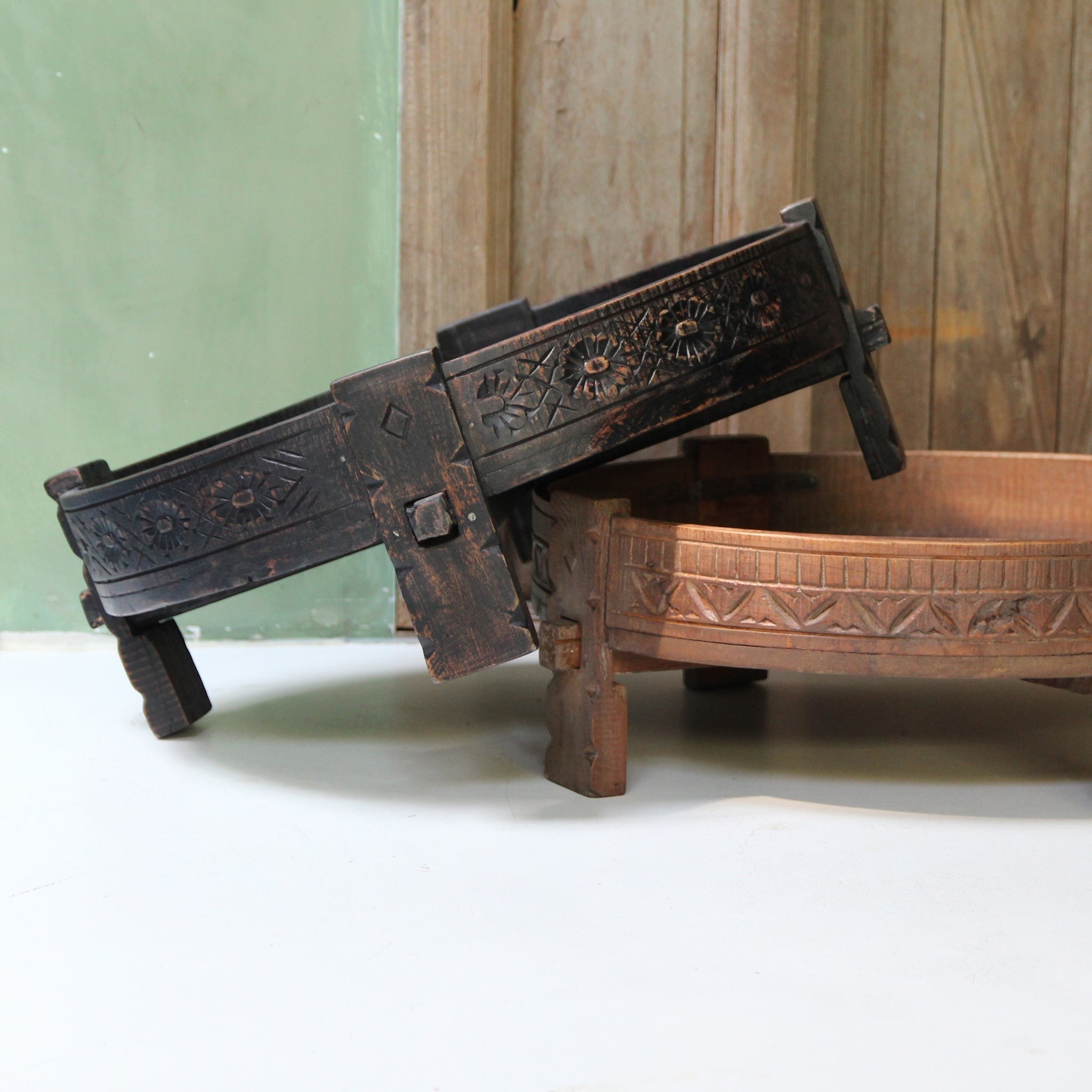 Kayu Living hand-carved black Chakki side table made from recycled wood with intricate floral patterns
