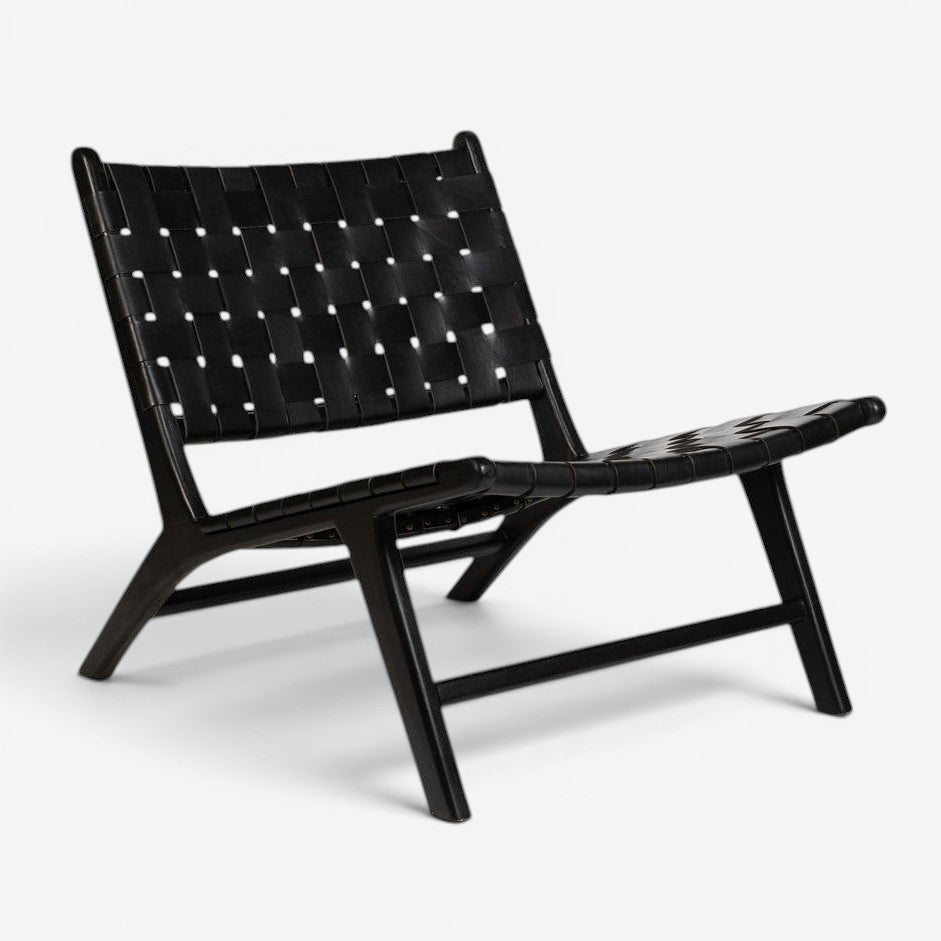 Kayu Living black handwoven leather lounge chair with black teak frame, modern design.