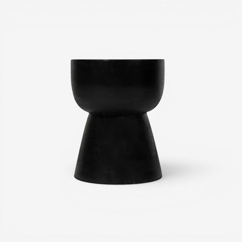 Kayu Living black solid suar wood cupped stool with unique natural grain and rustic charm.