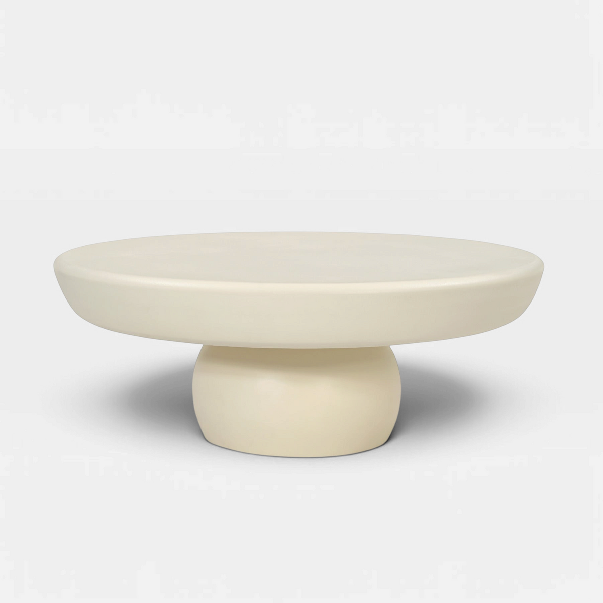 Kayu Living Brix Dune 80 cm round coffee table in beige beton cire with a minimalist pedestal base