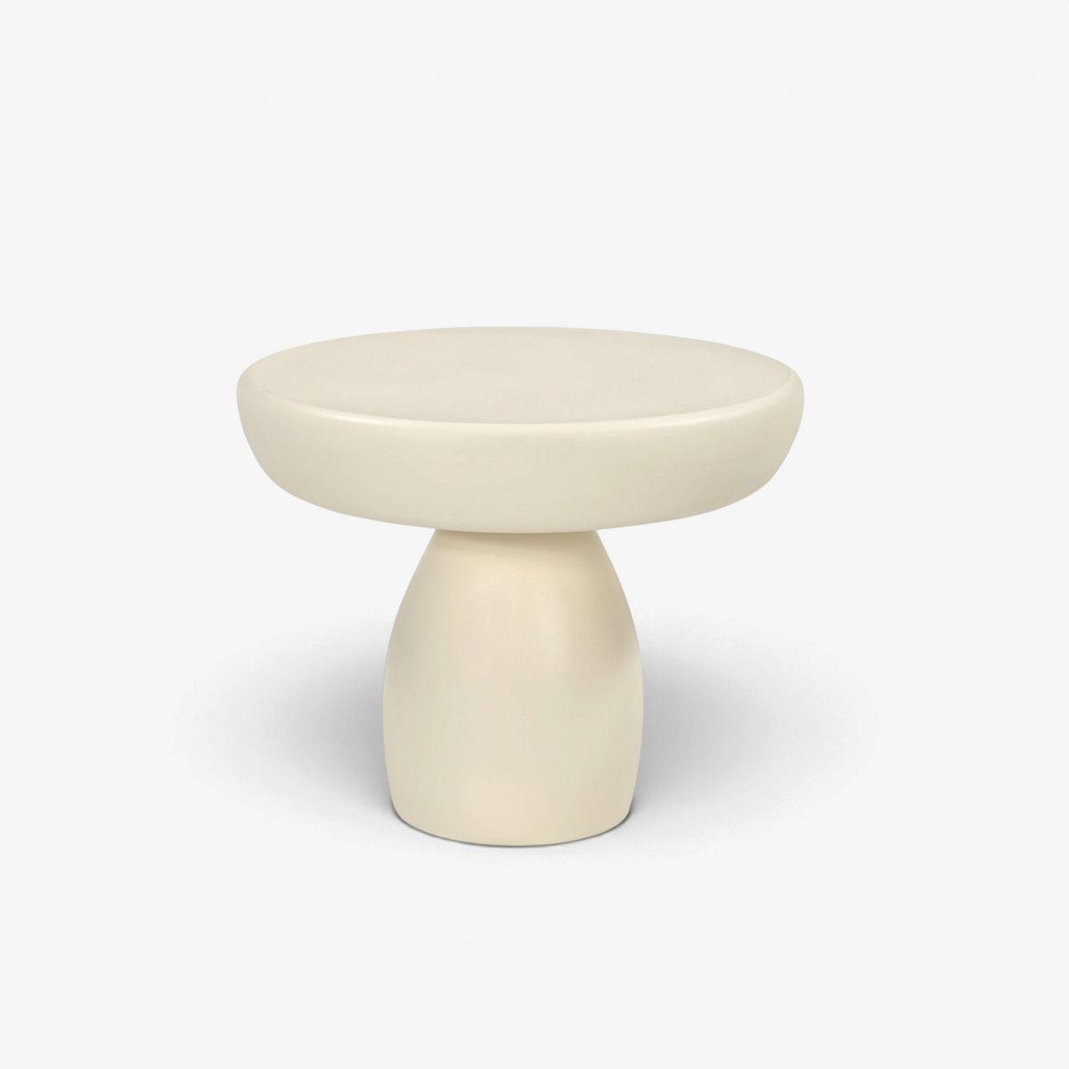 Kayu Living Brix Dune 50 cm coffee table in beige beton cire with a minimalist pedestal base and round top.