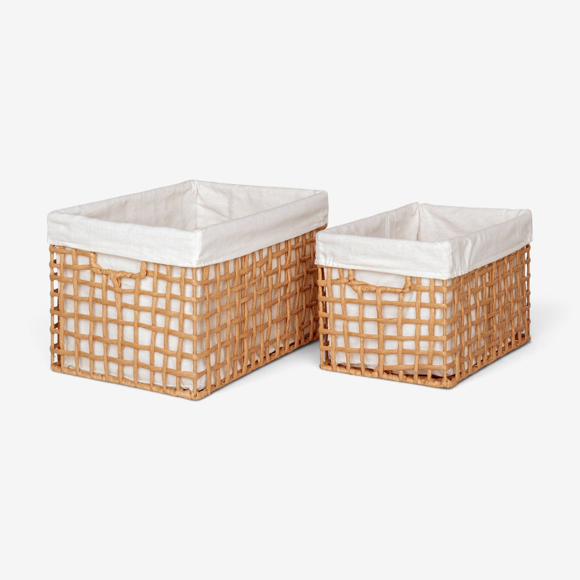Kayu Living Bustelo Baskets set of two natural paper storage bins with white fabric liners and sturdy metal frames.