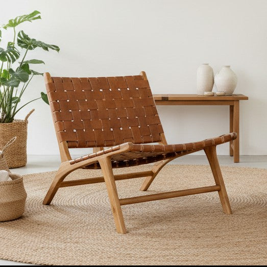 Kayu Living Sanur lounge chair with handwoven camel leather seat and teak frame.
