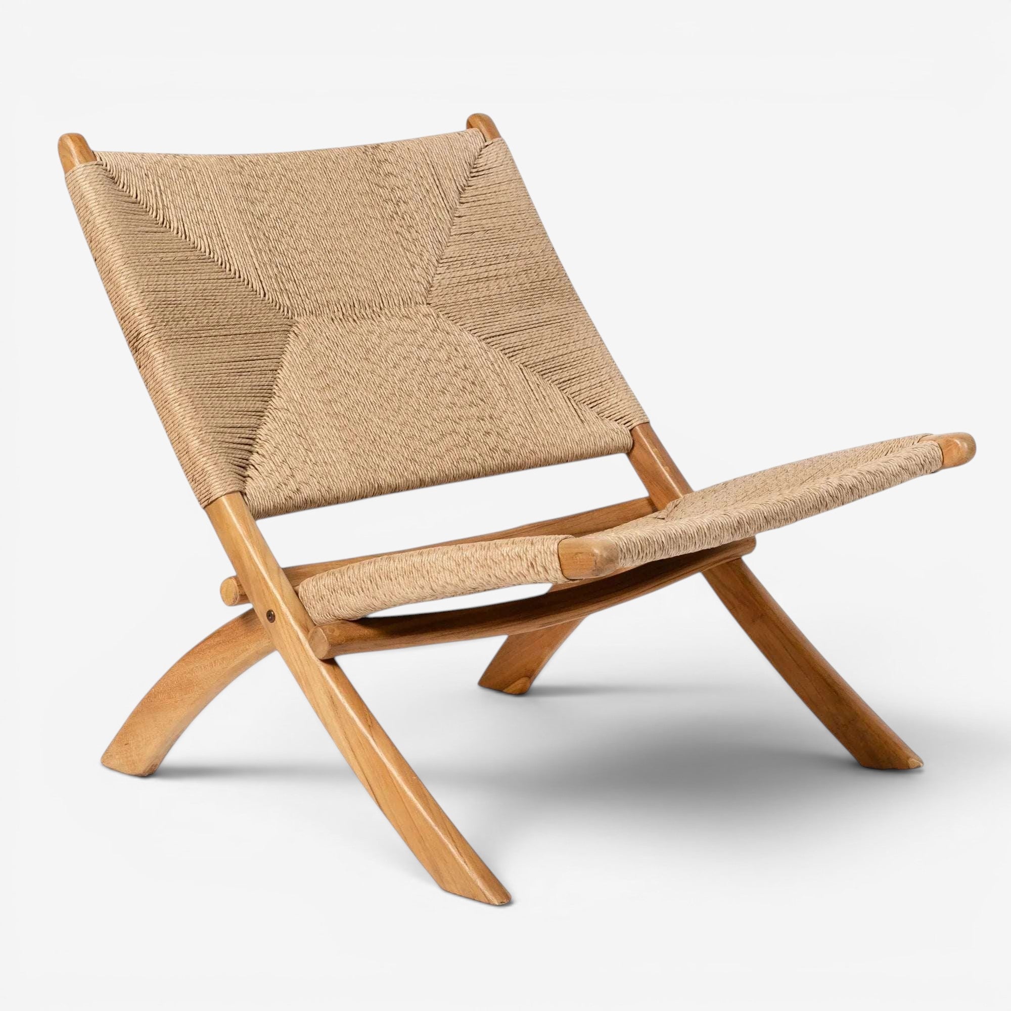 Kayu Living Cemagi foldable lounge chair with natural woven rope seat and teak wood frame. Modern, minimalist design.