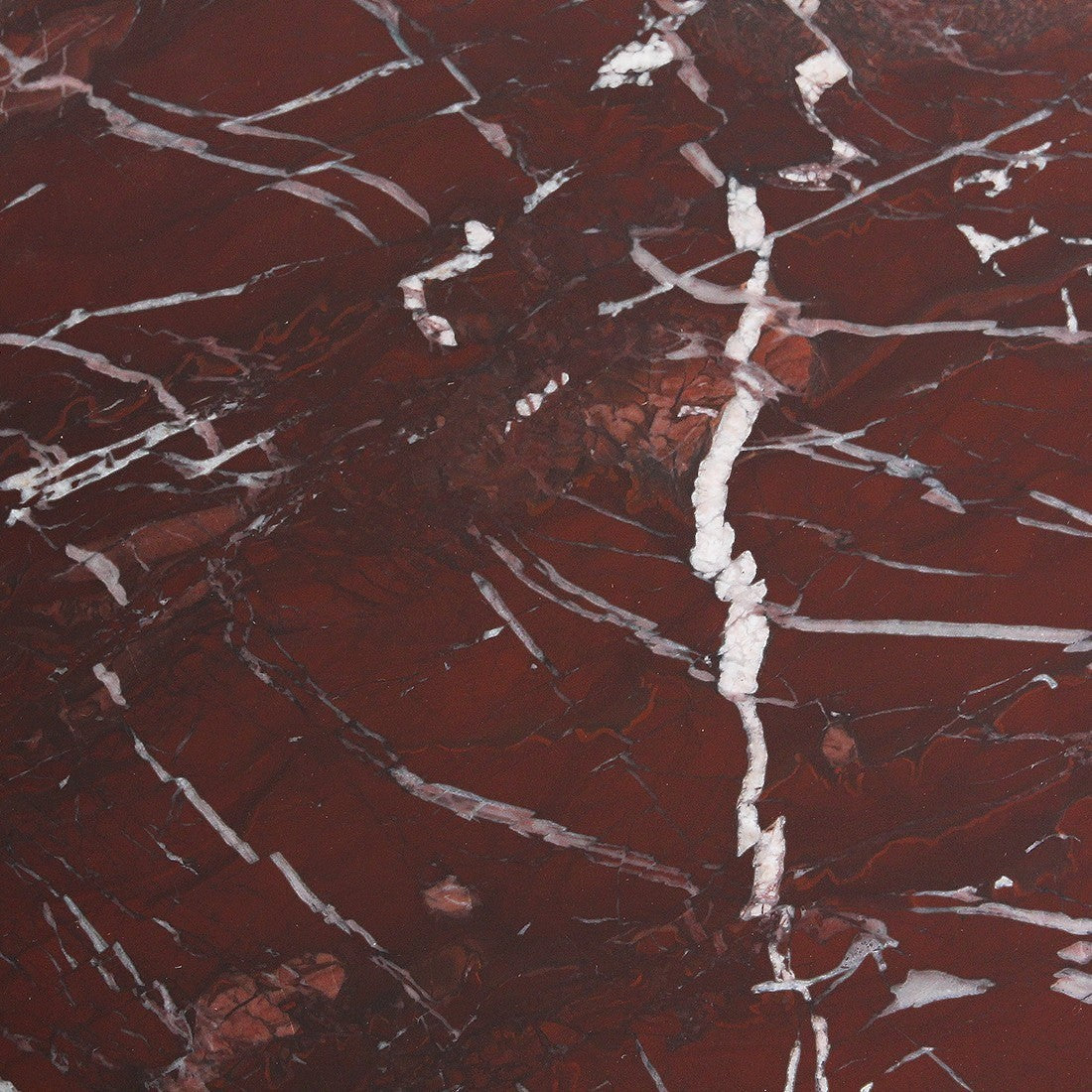 Kayu Living burgundy marble side table top with dramatic white veining and unique natural stone texture.
