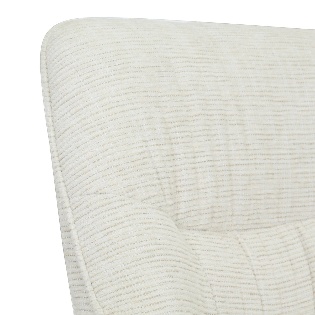 Close-up of the sand-coloured textured fabric upholstery on a Kayu Living Daphne swivel armchair.