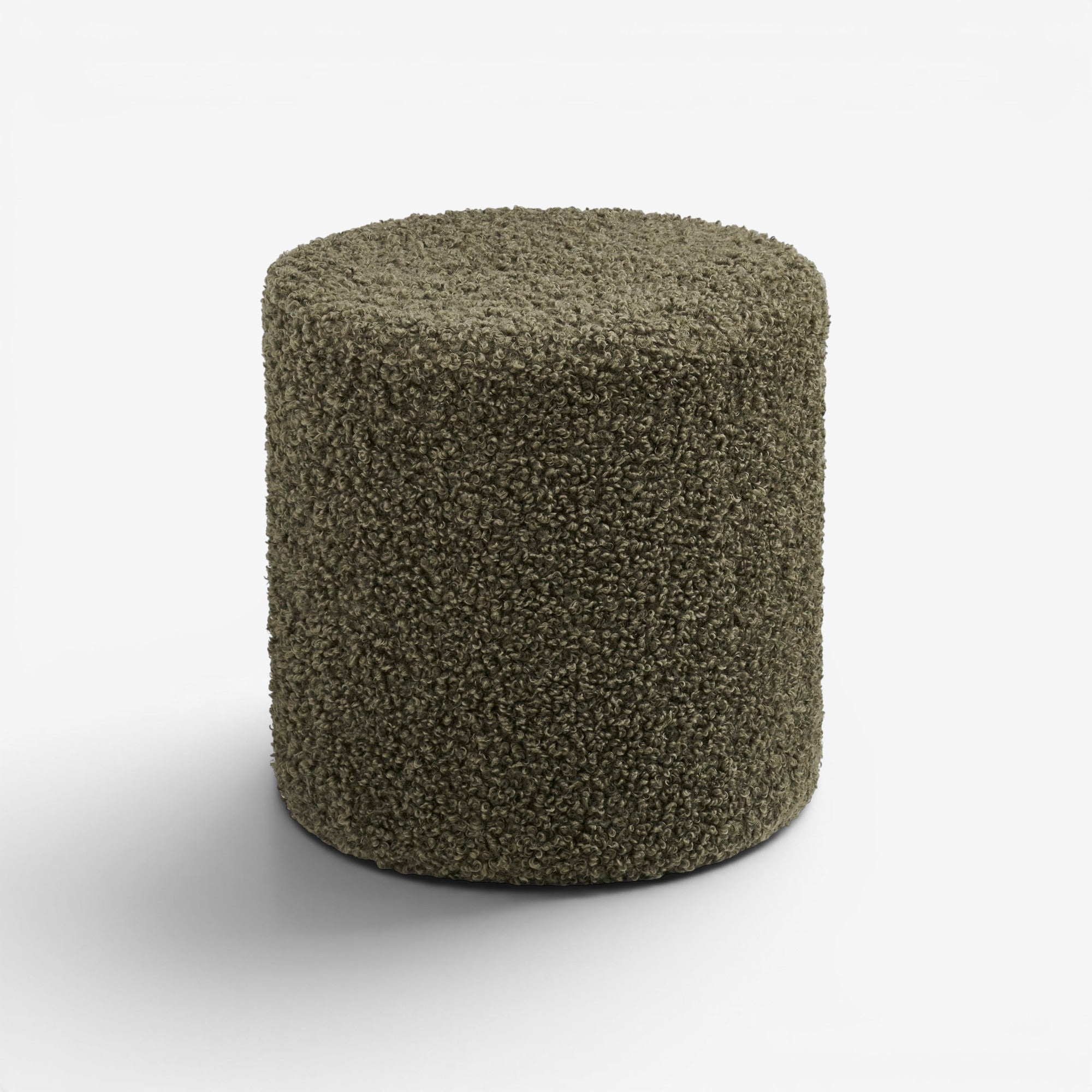 Kayu Living Ejby Pouf in elegant green teddy plush polyester. Compact cylinder seating for living room or bedroom.