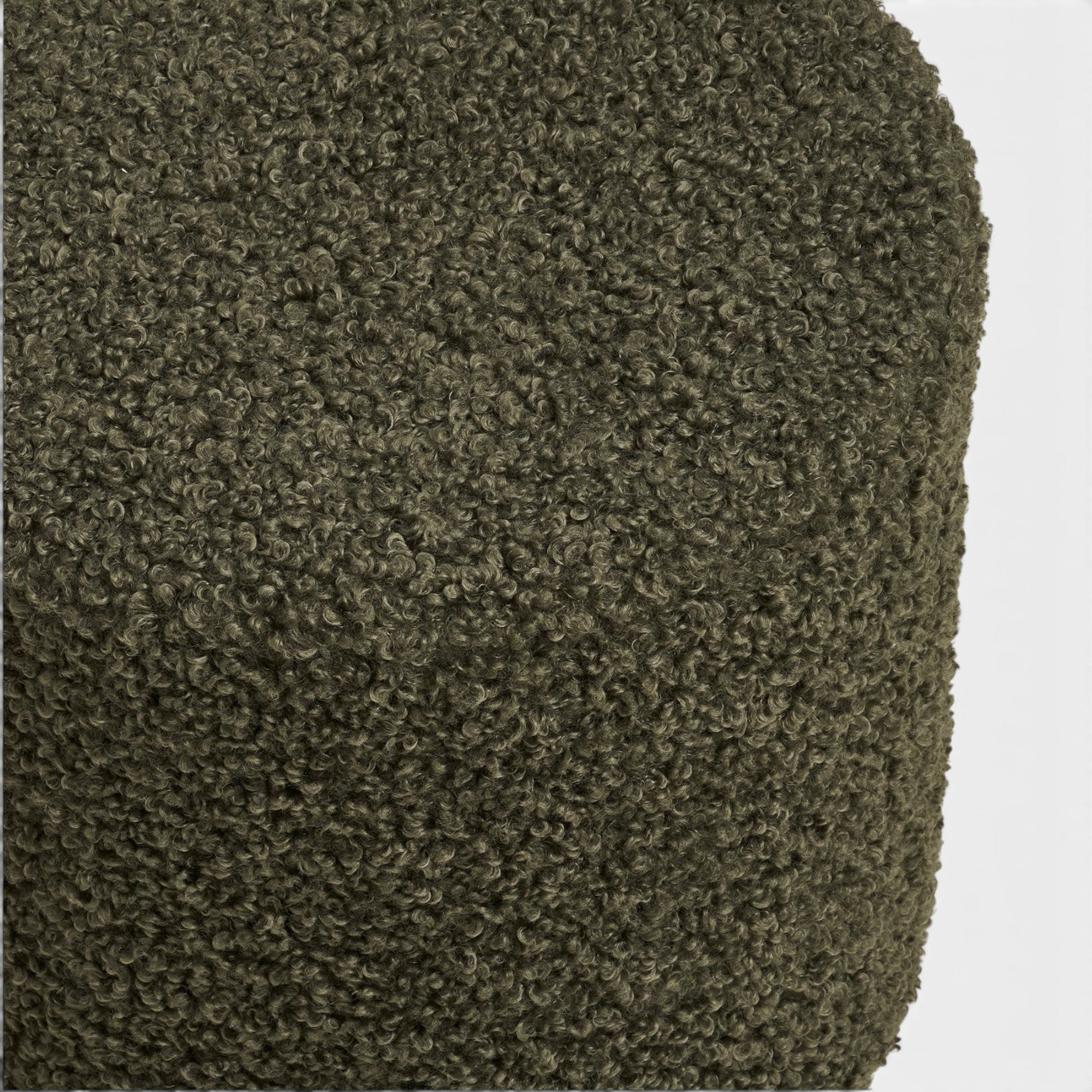 Kayu Living Ejby Pouf in elegant green teddy polyester. Cozy, durable seating for living rooms or bedrooms.